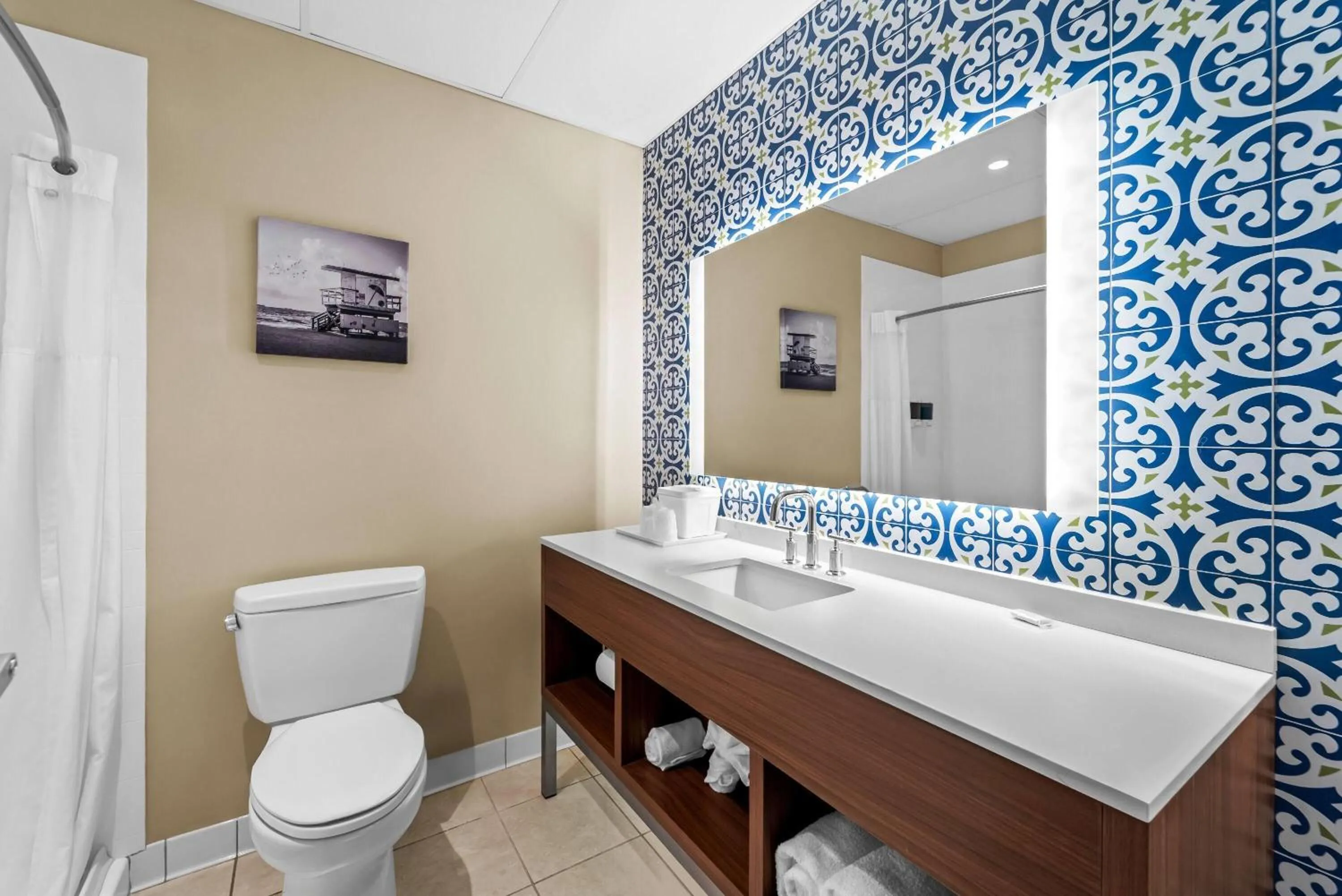 Bathroom in Days Inn & Suites by Wyndham Fort Myers Near JetBlue Park