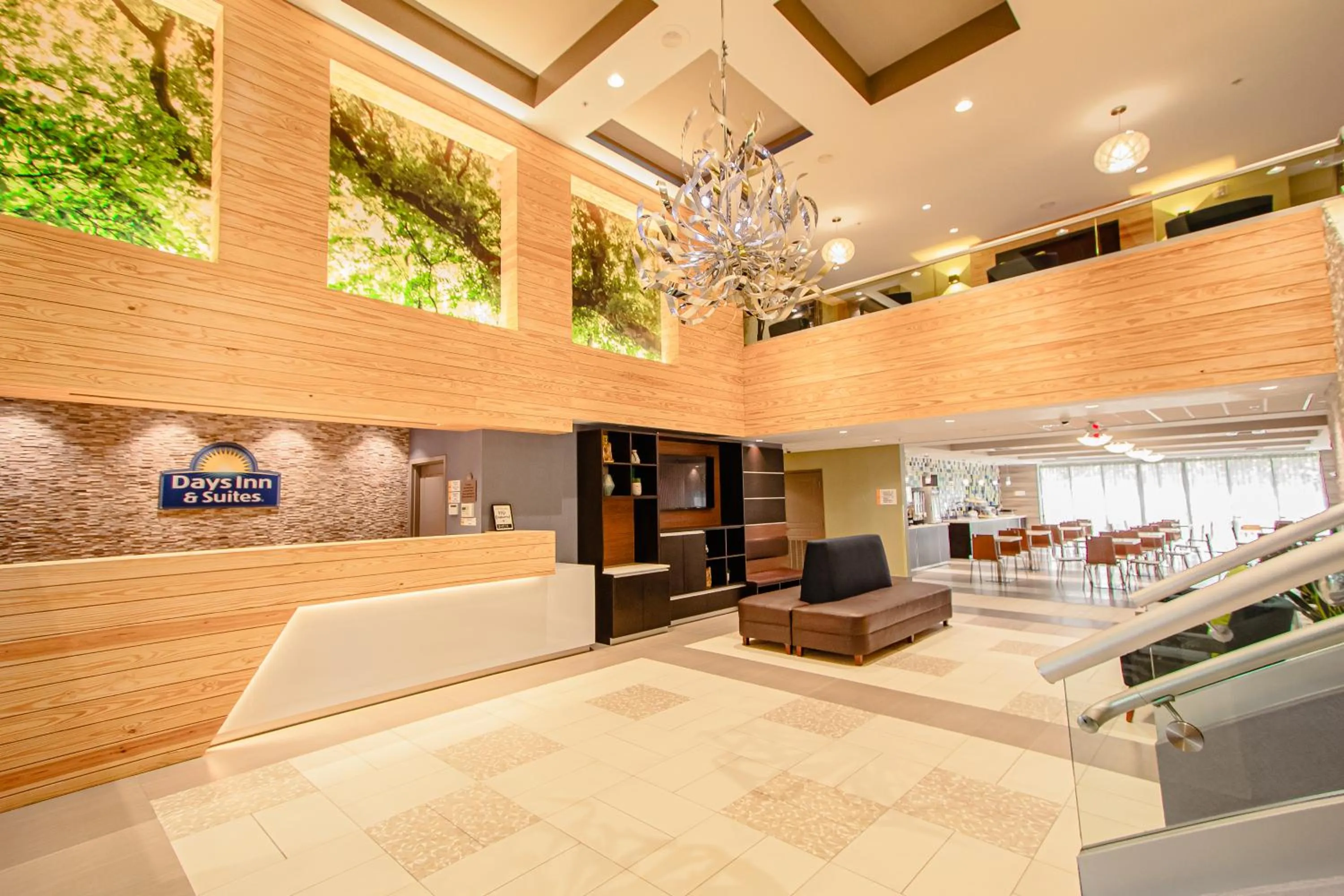 Lobby or reception in Days Inn & Suites by Wyndham Fort Myers Near JetBlue Park
