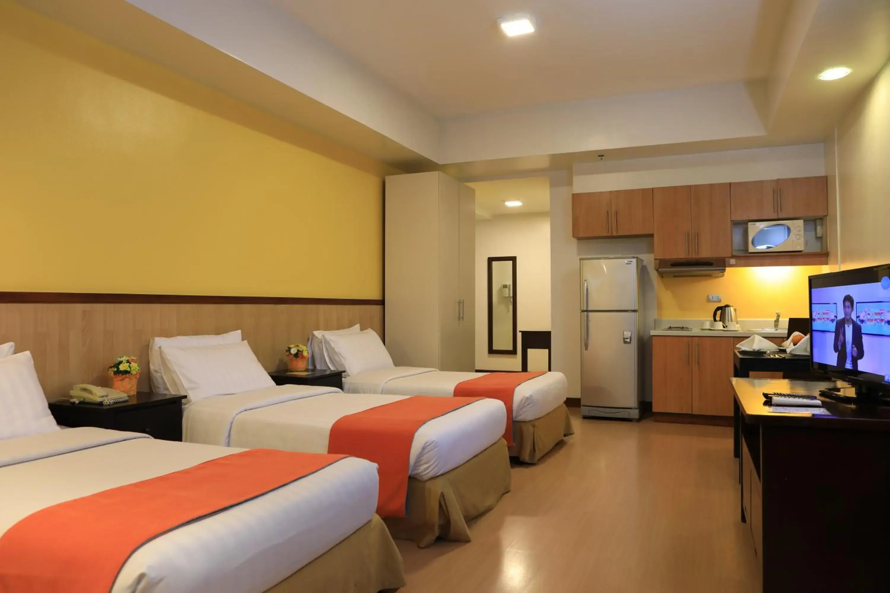 Studio Triple Deluxe Room in The Malayan Plaza Hotel Studio Triple Deluxe Room in The Malayan Plaza Hotel