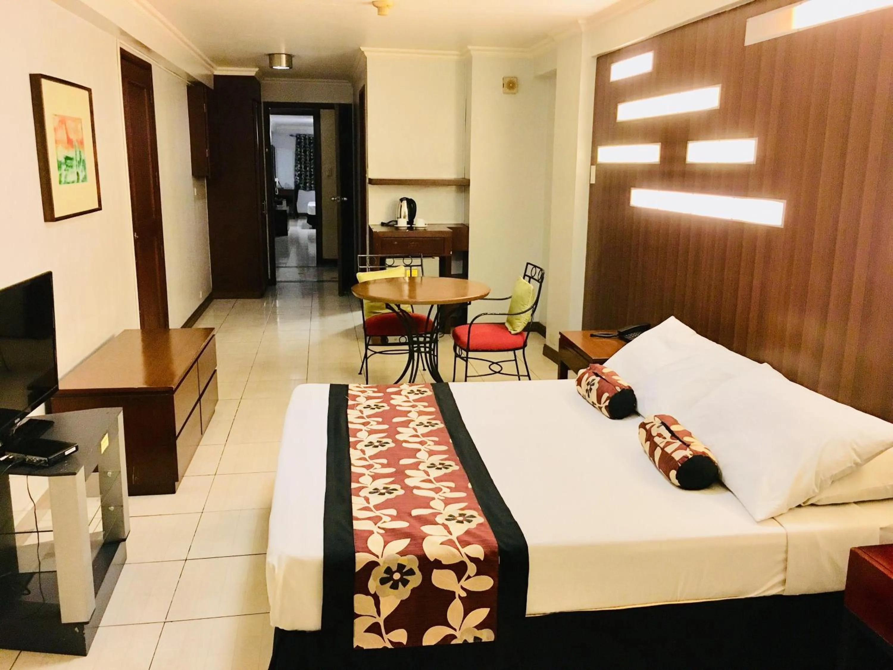 Bed in Jupiter Suites