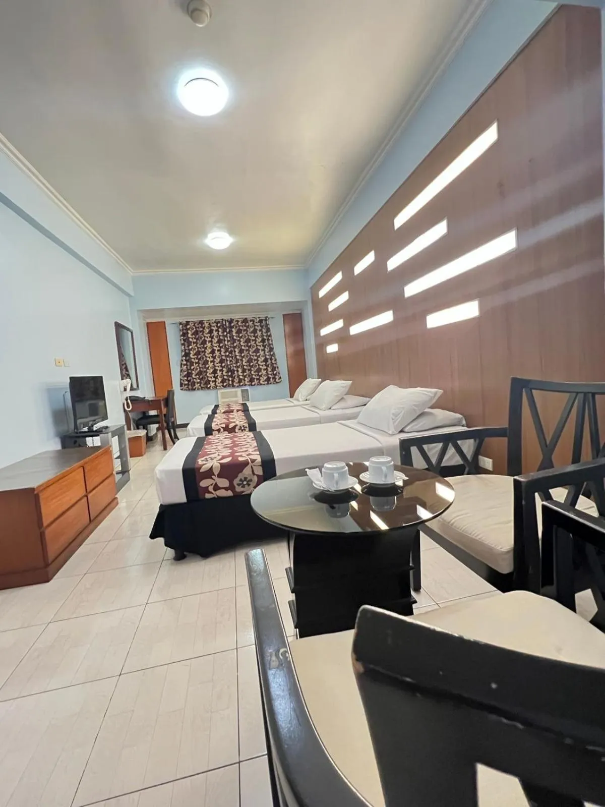 Bed in Jupiter Suites