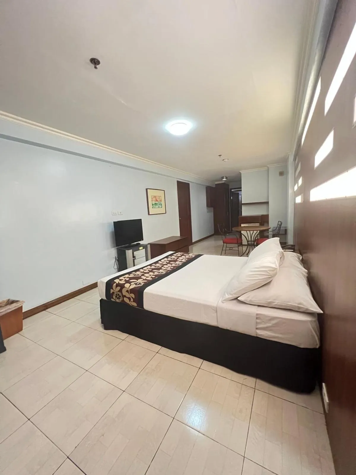 Bed in Jupiter Suites