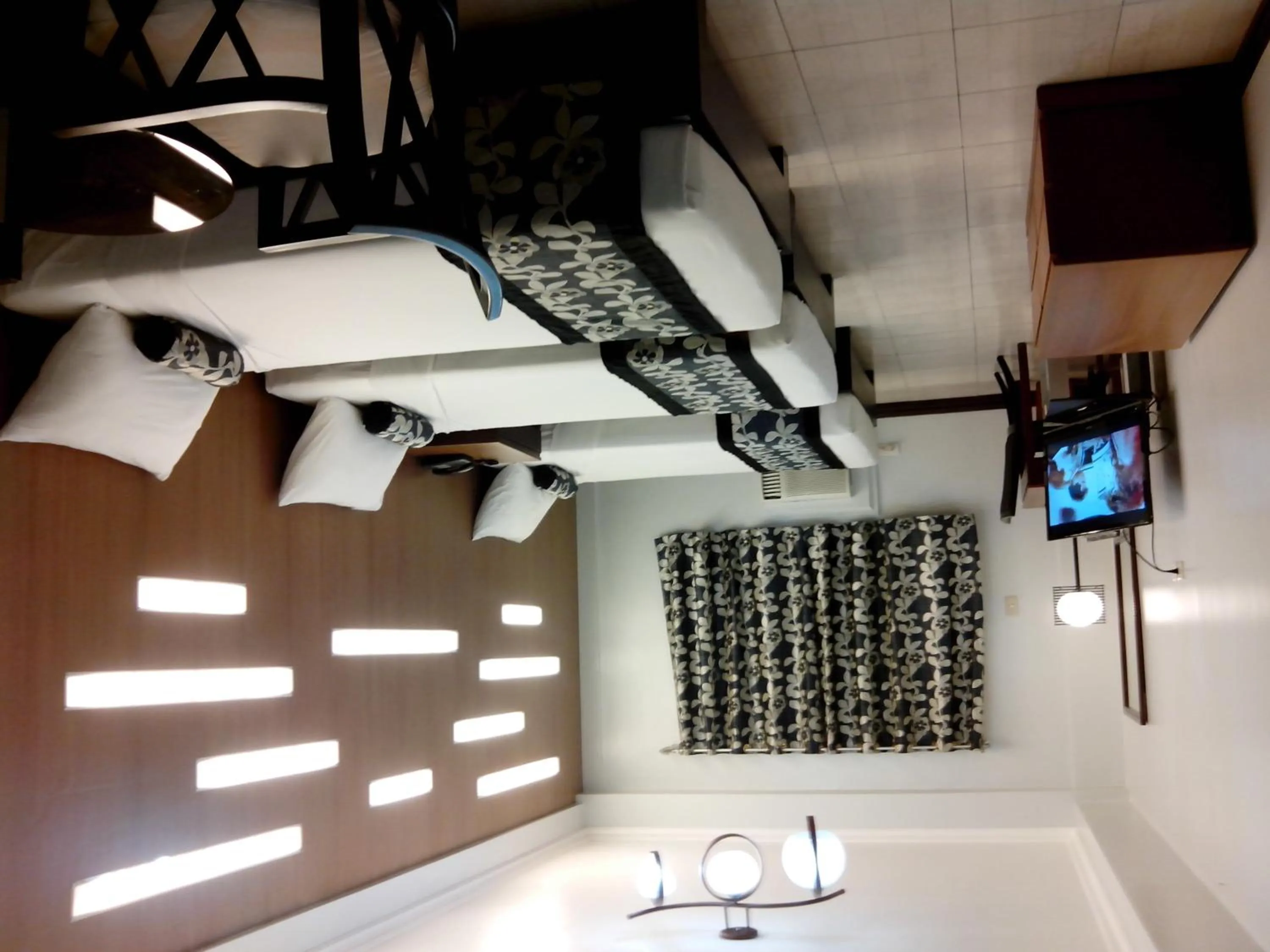 Bed in Jupiter Suites