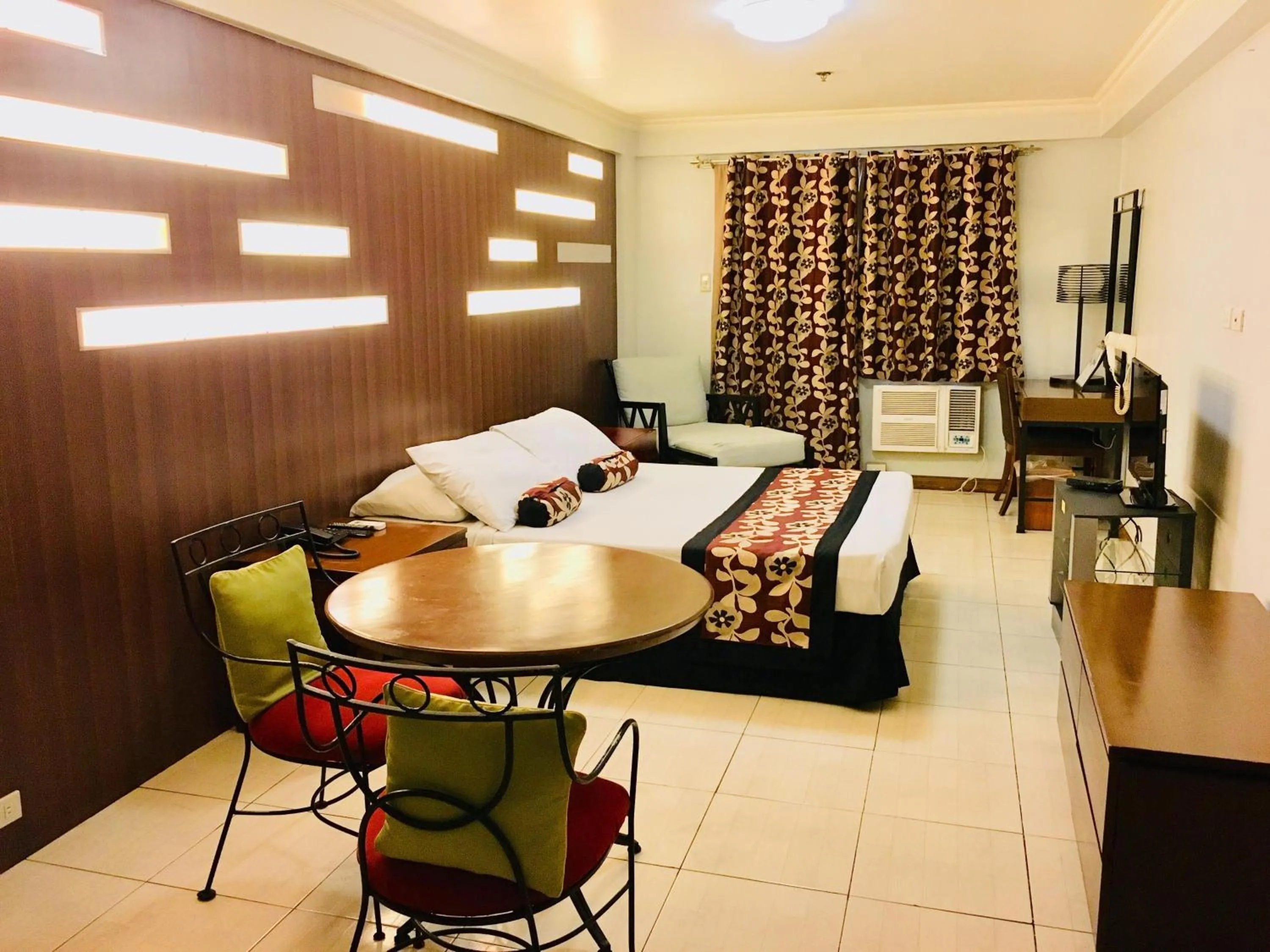 Bed in Jupiter Suites