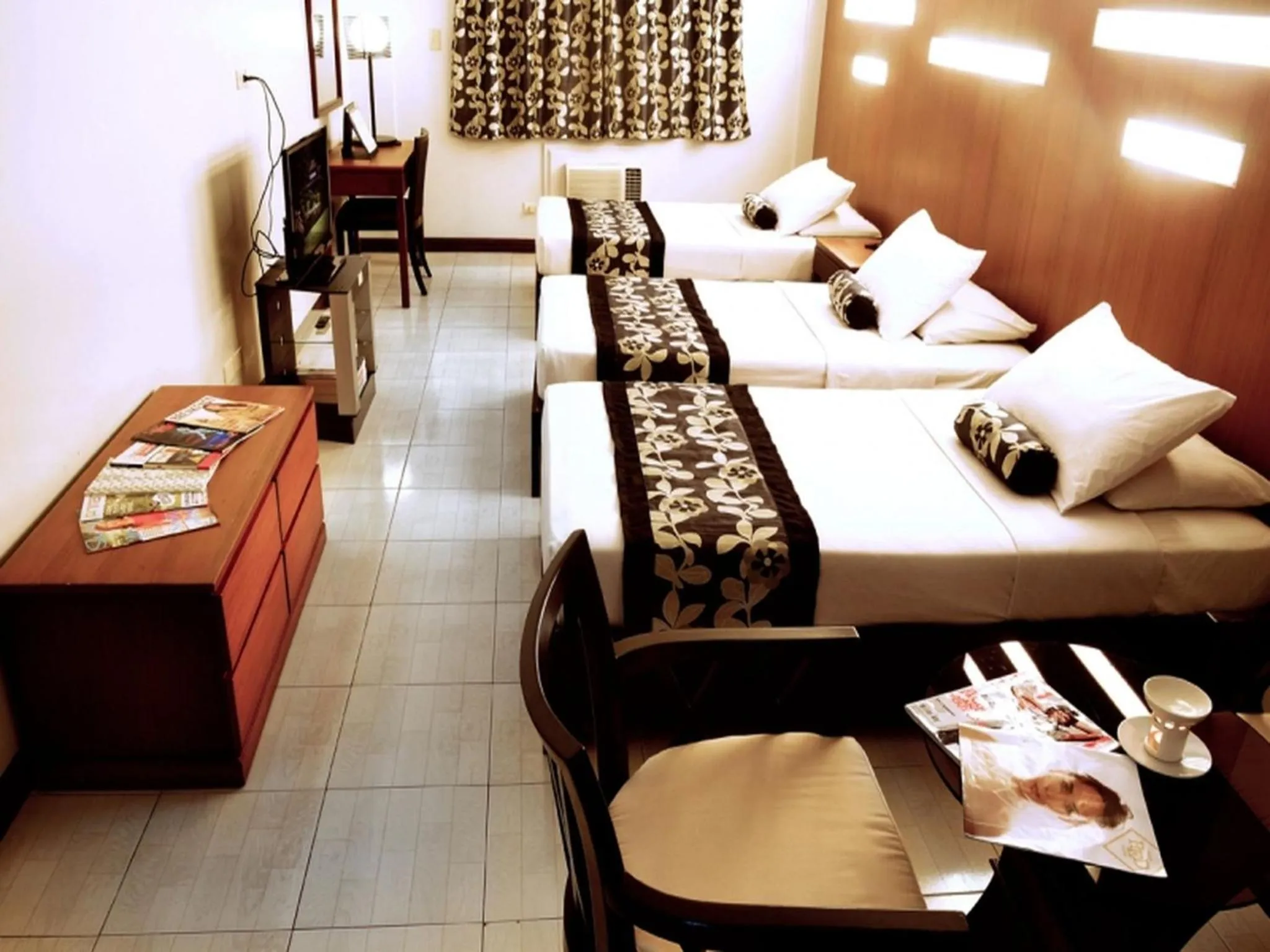 Bed in Jupiter Suites