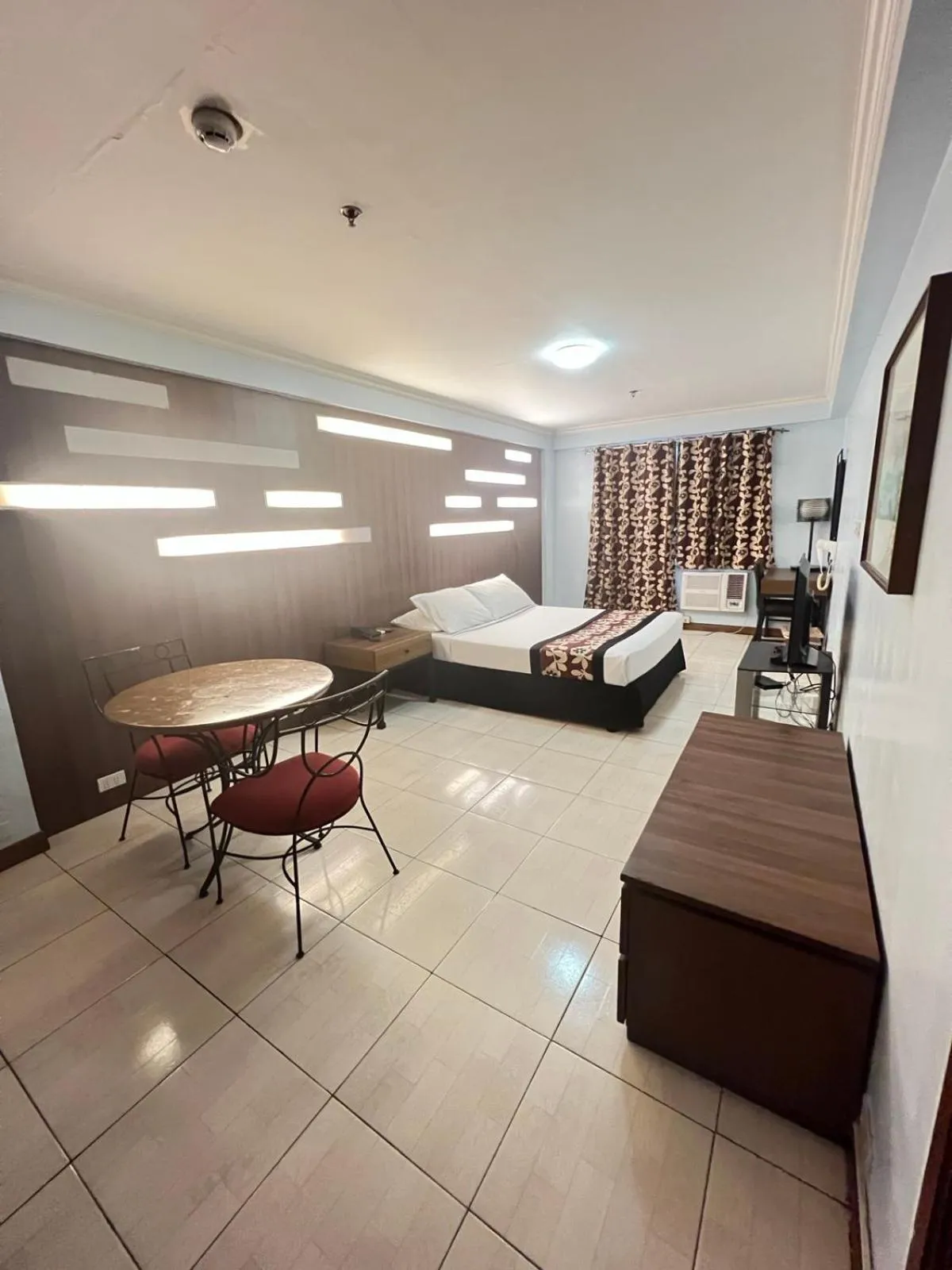 Bed in Jupiter Suites