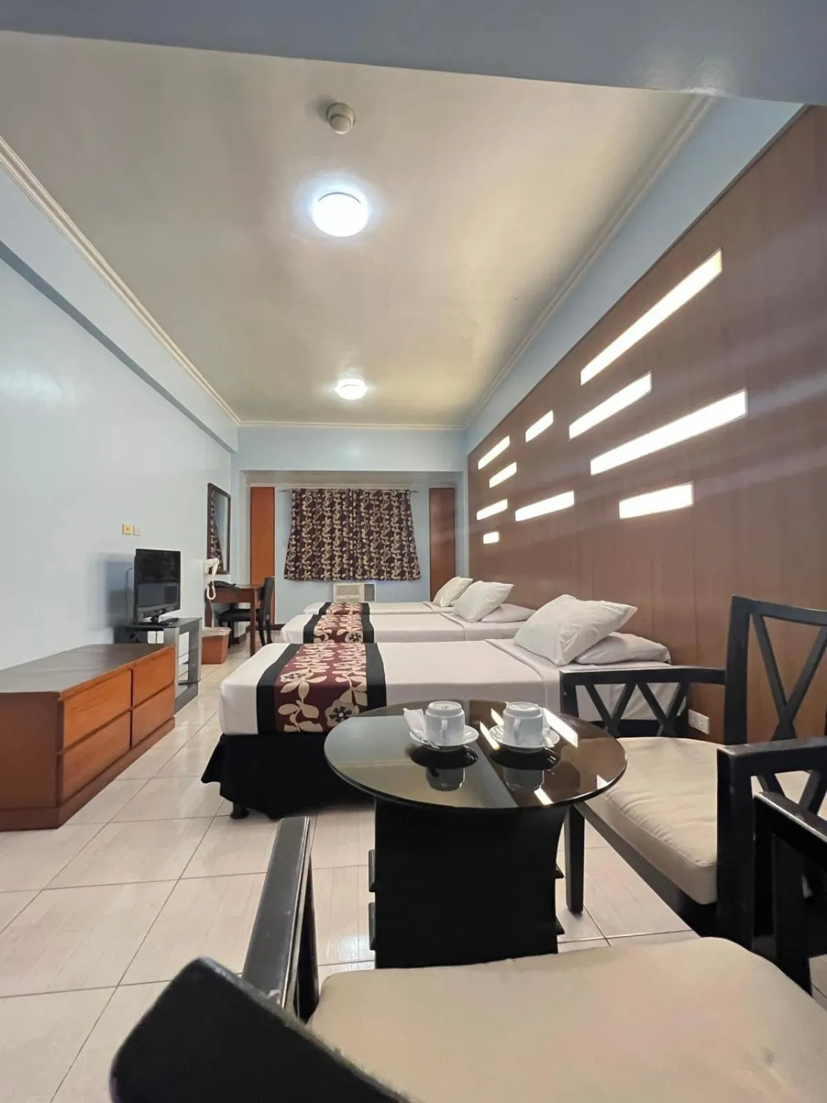 Bed in Jupiter Suites