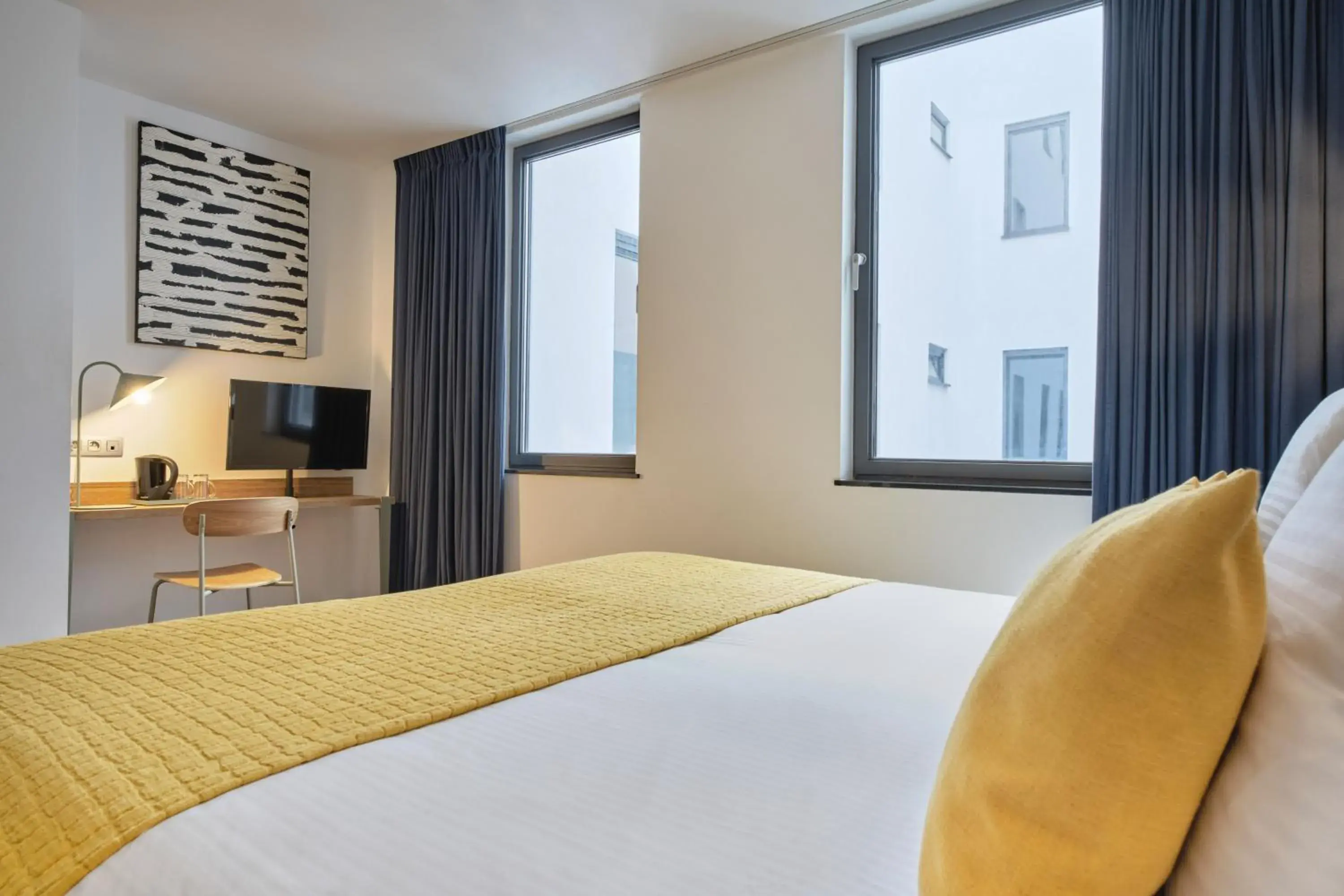 Bedroom, Bed in Hôtel Aqua by HappyCulture Bedroom, Bed in Hôtel Aqua by HappyCulture