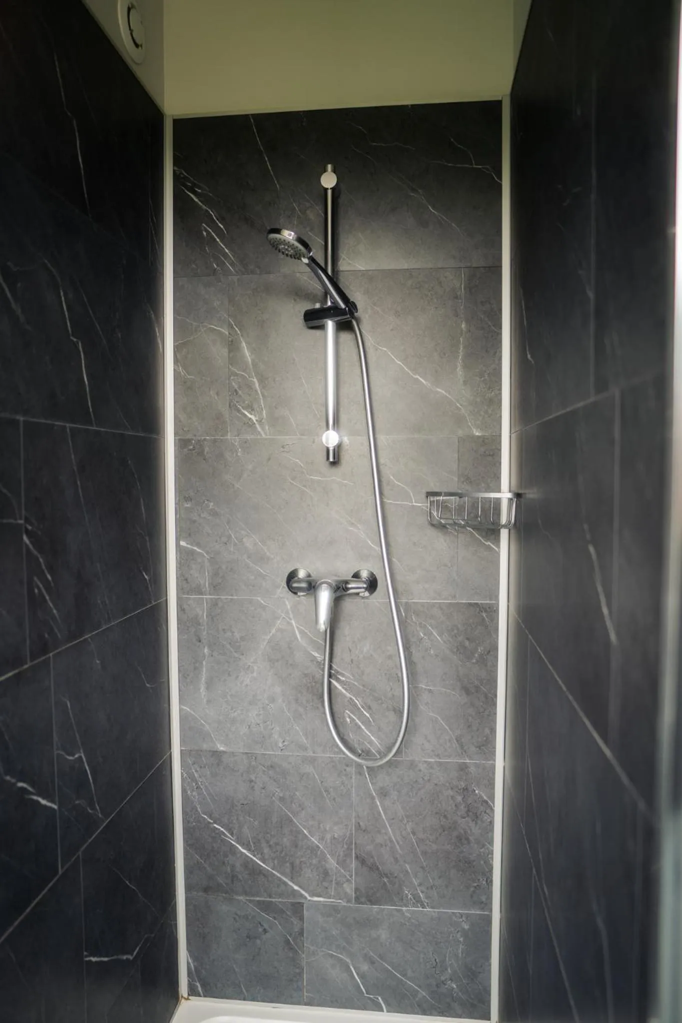 Shower in Logis Hotel Spa Restaurant Au Site Normand