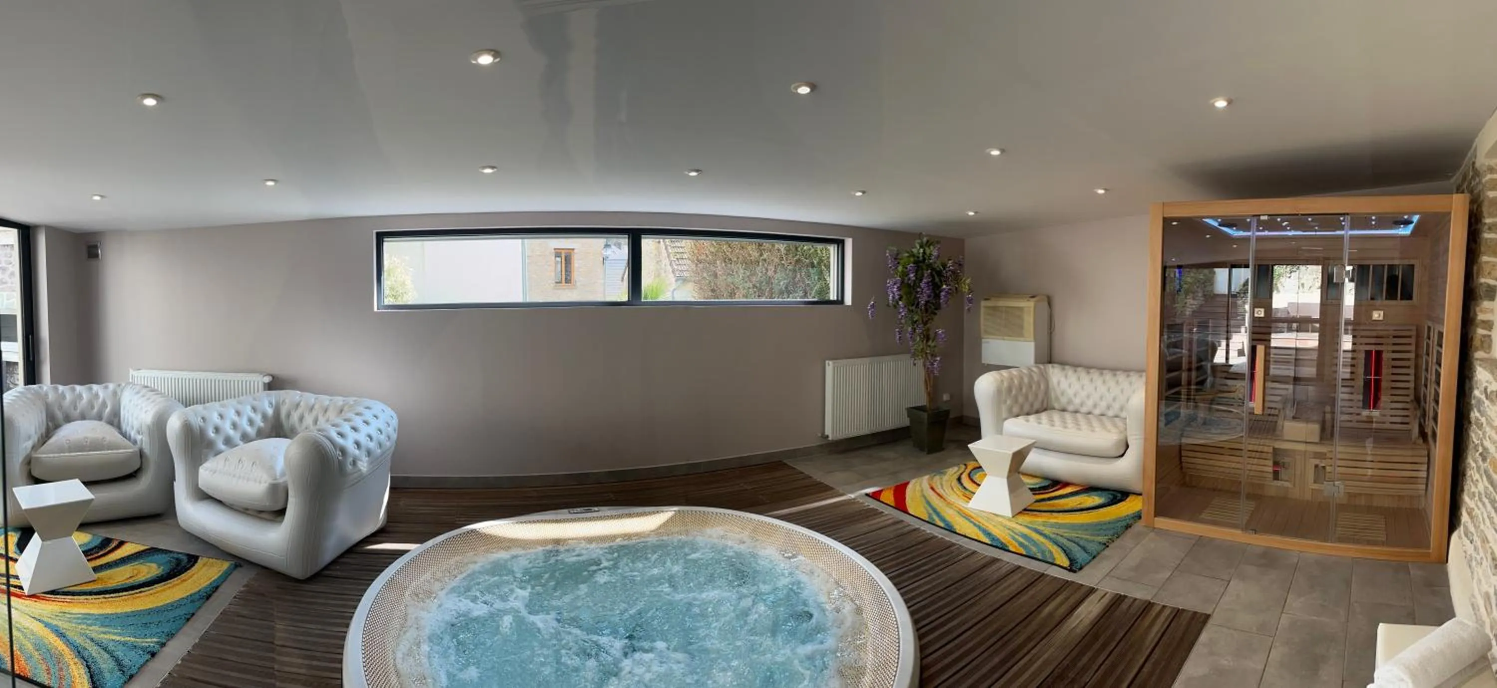 Hot Tub in Logis Hotel Spa Restaurant Au Site Normand