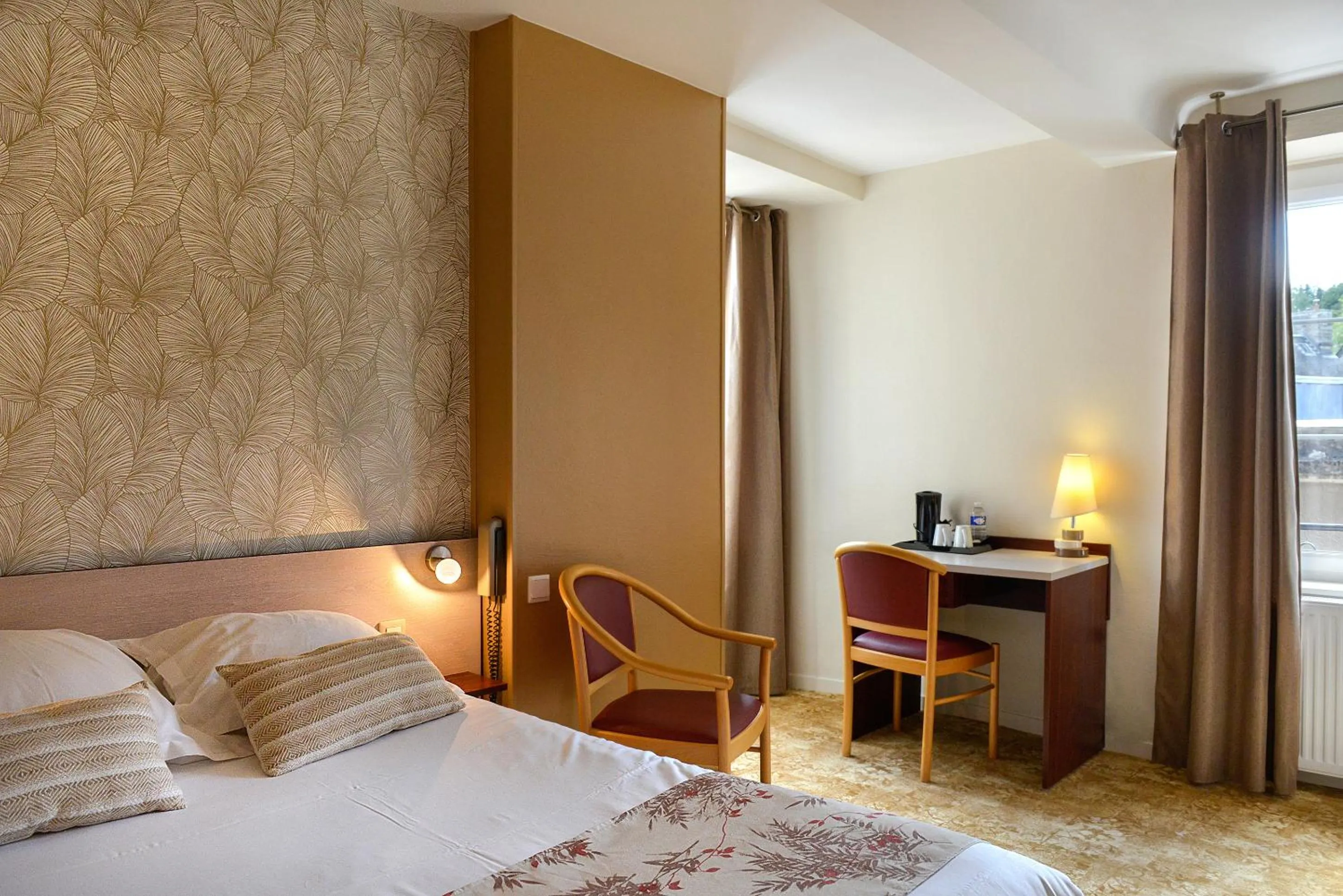 Bed in Logis Hotel Spa Restaurant Au Site Normand