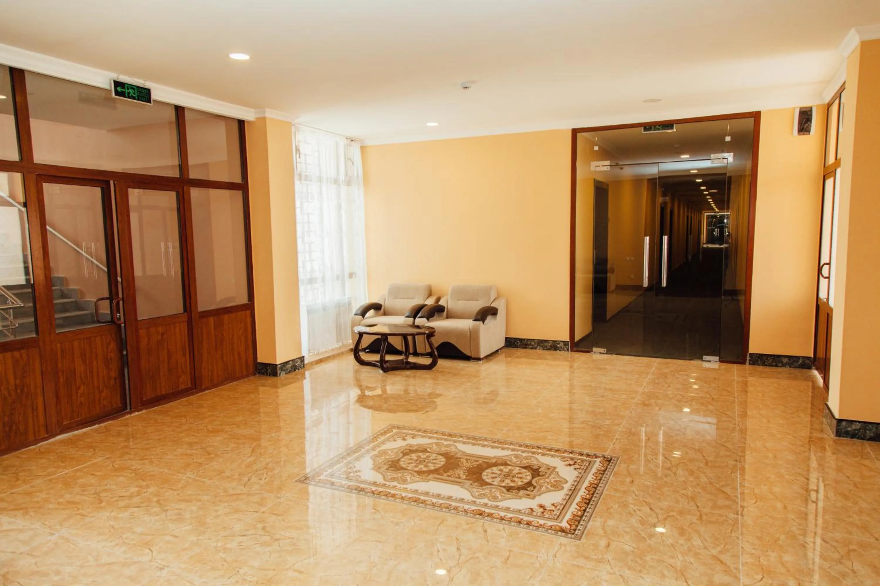 Communal lounge/ TV room in Bek Khiva Hotel