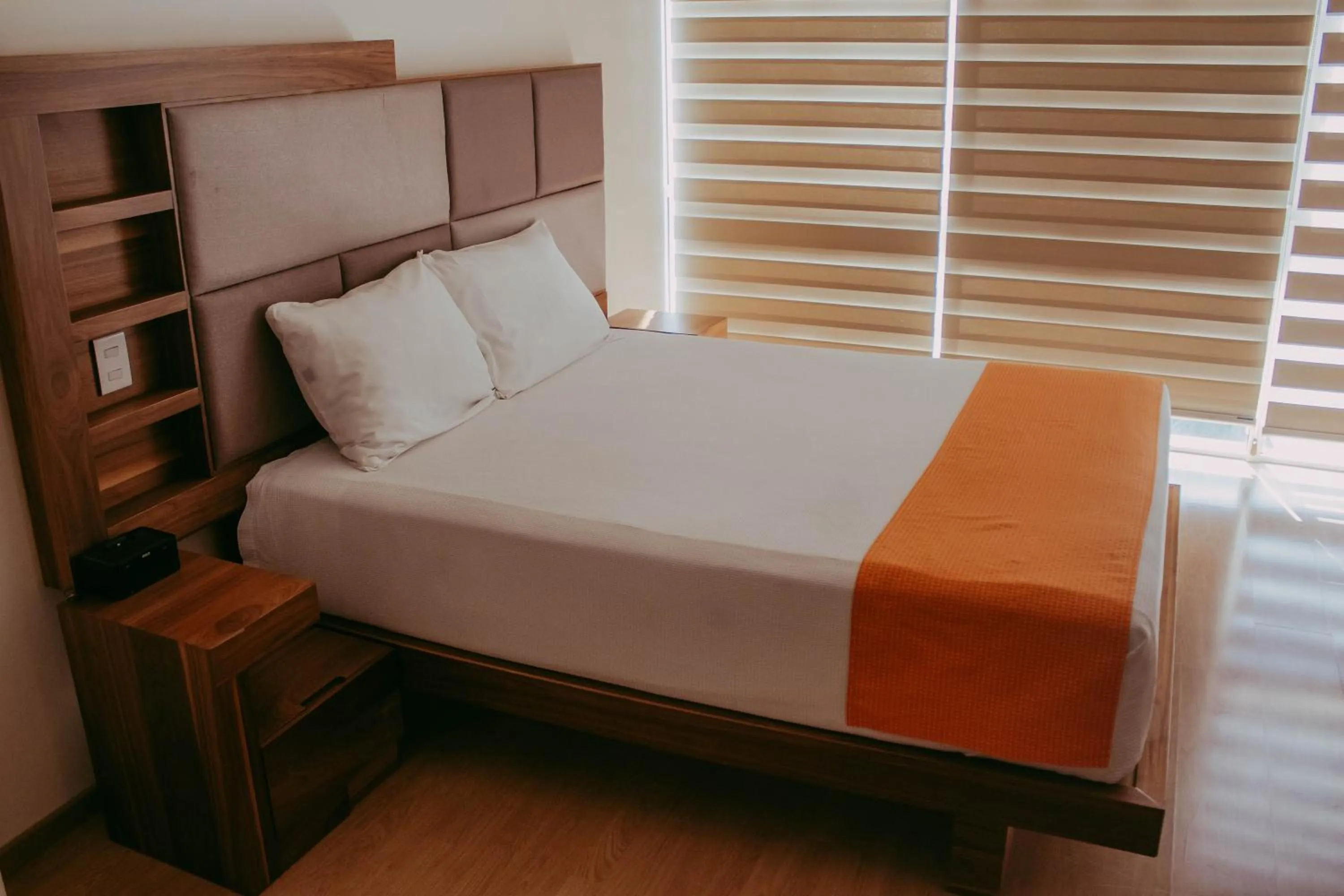 Bed in Millenium Plaza & Suites