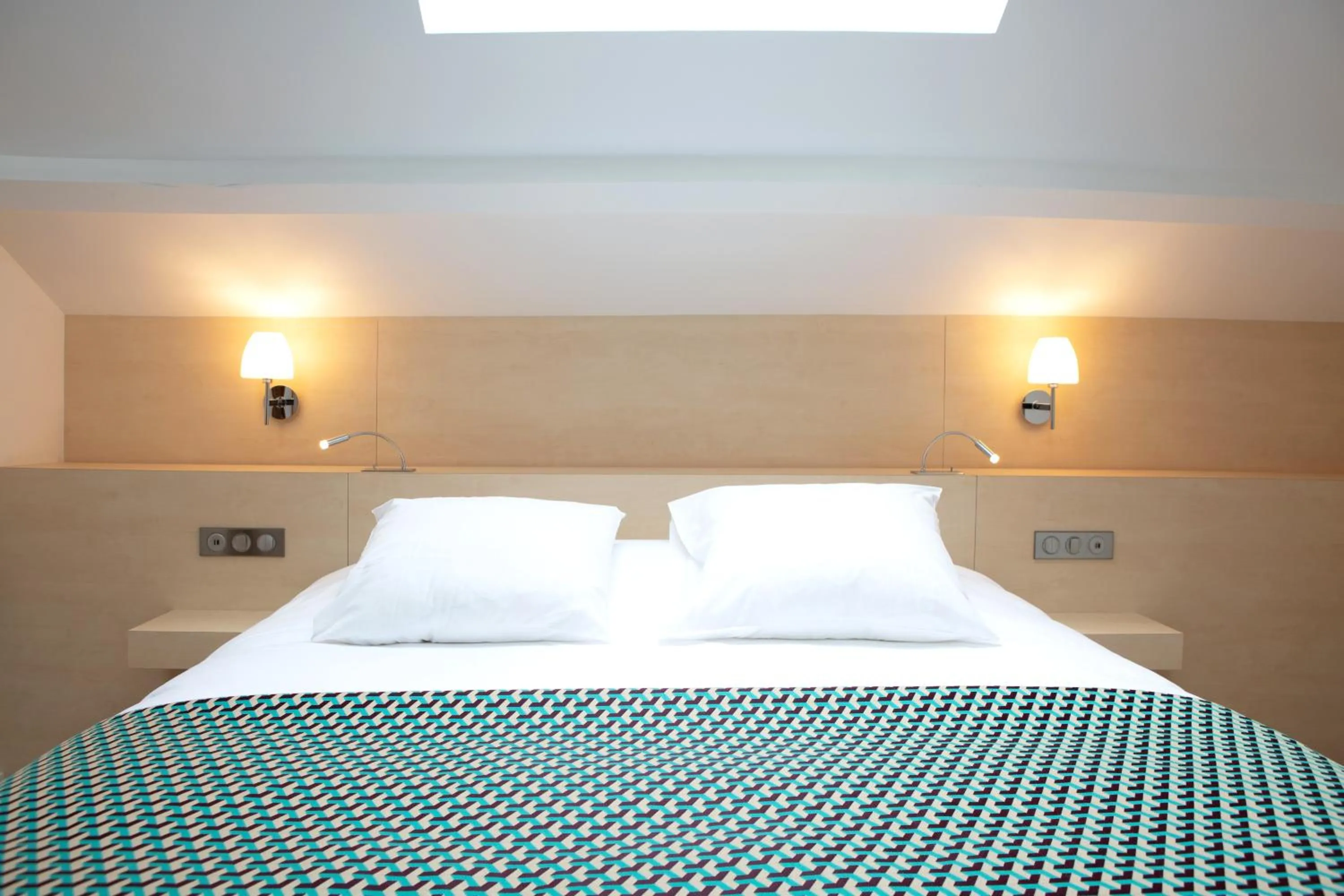 Bed in Hotel Le Clos De La Vouge