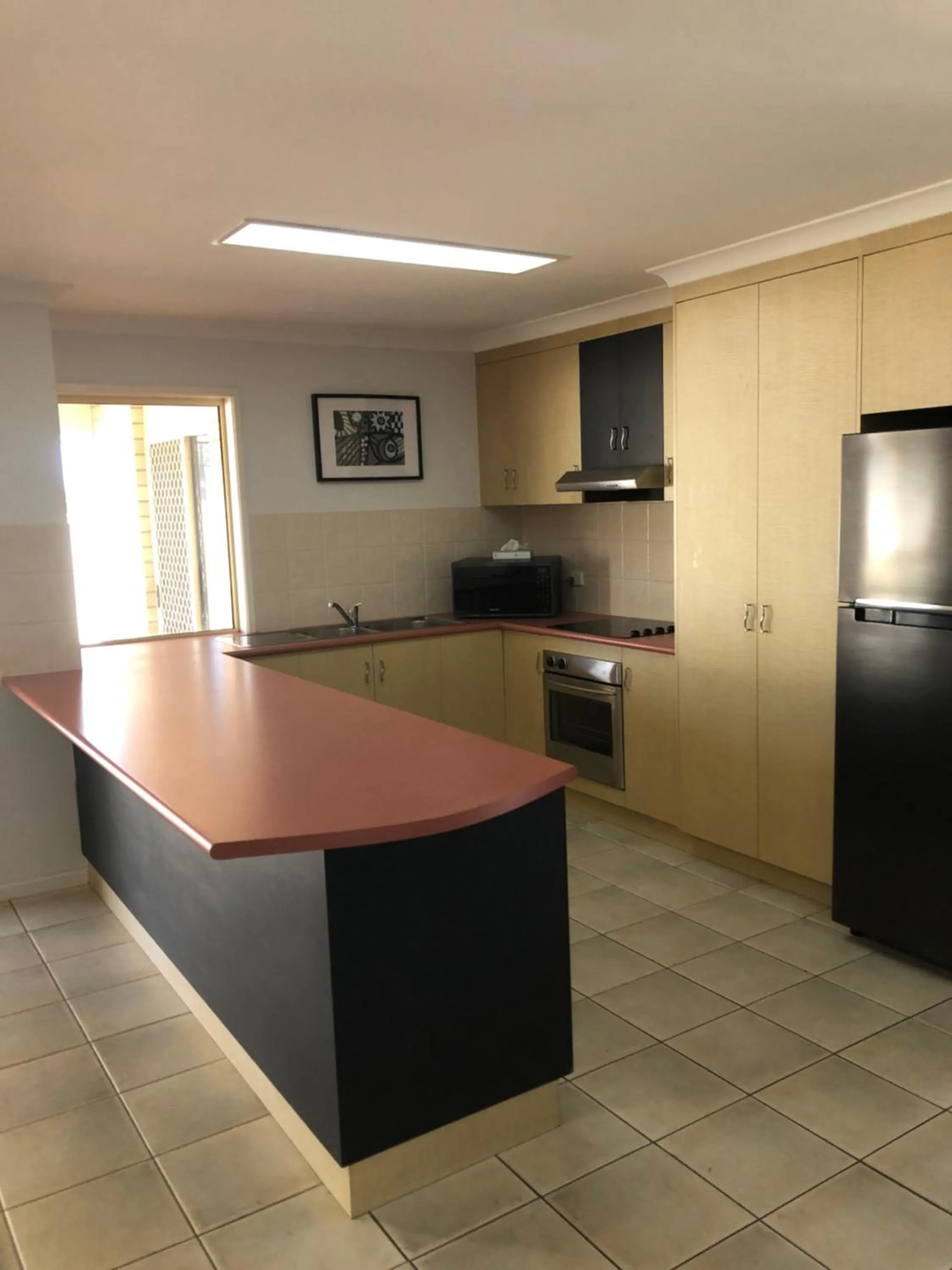 Kitchen or kitchenette in Western Heritage Motor Inn