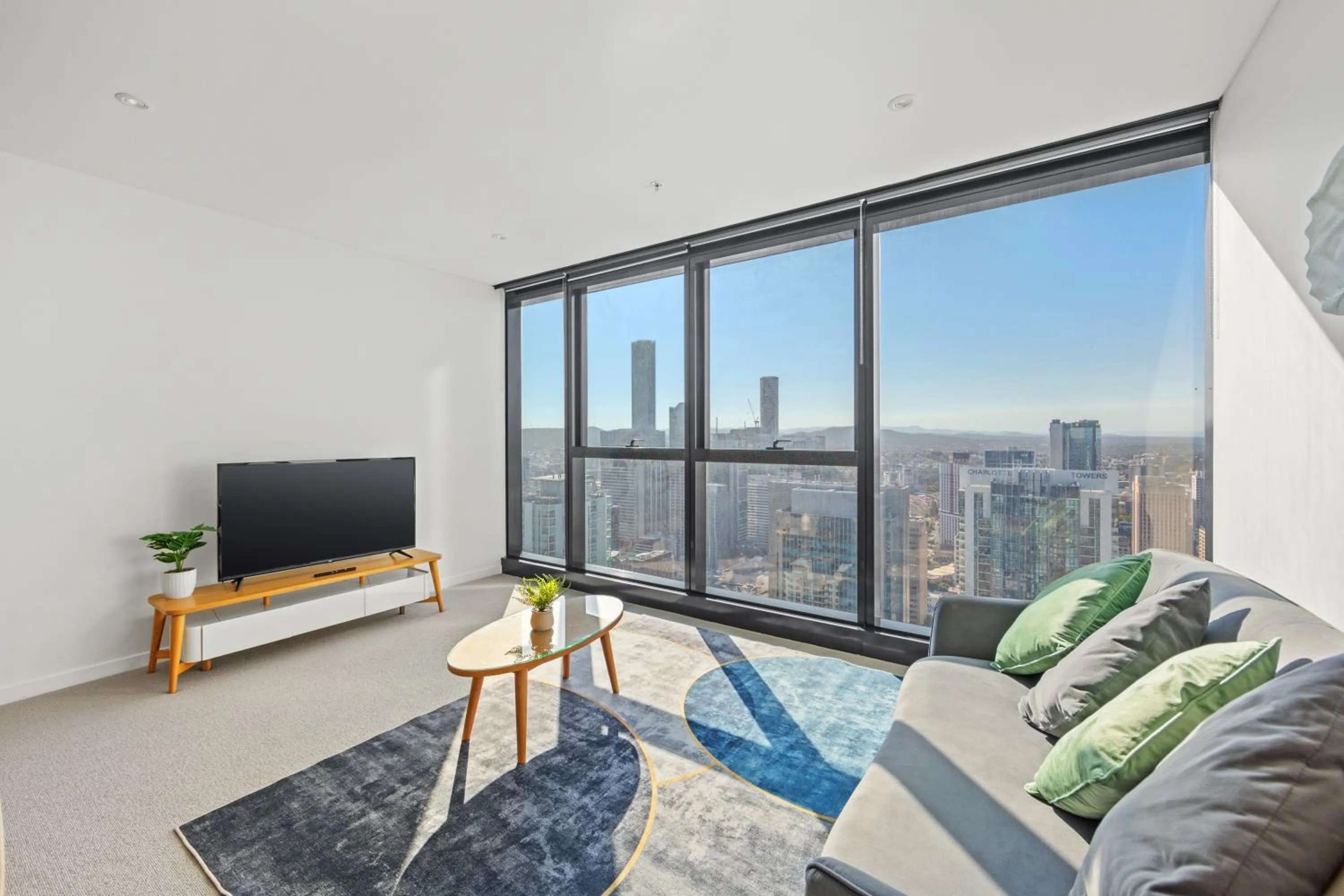 Living room in Brisbane Skytower by CLLIX