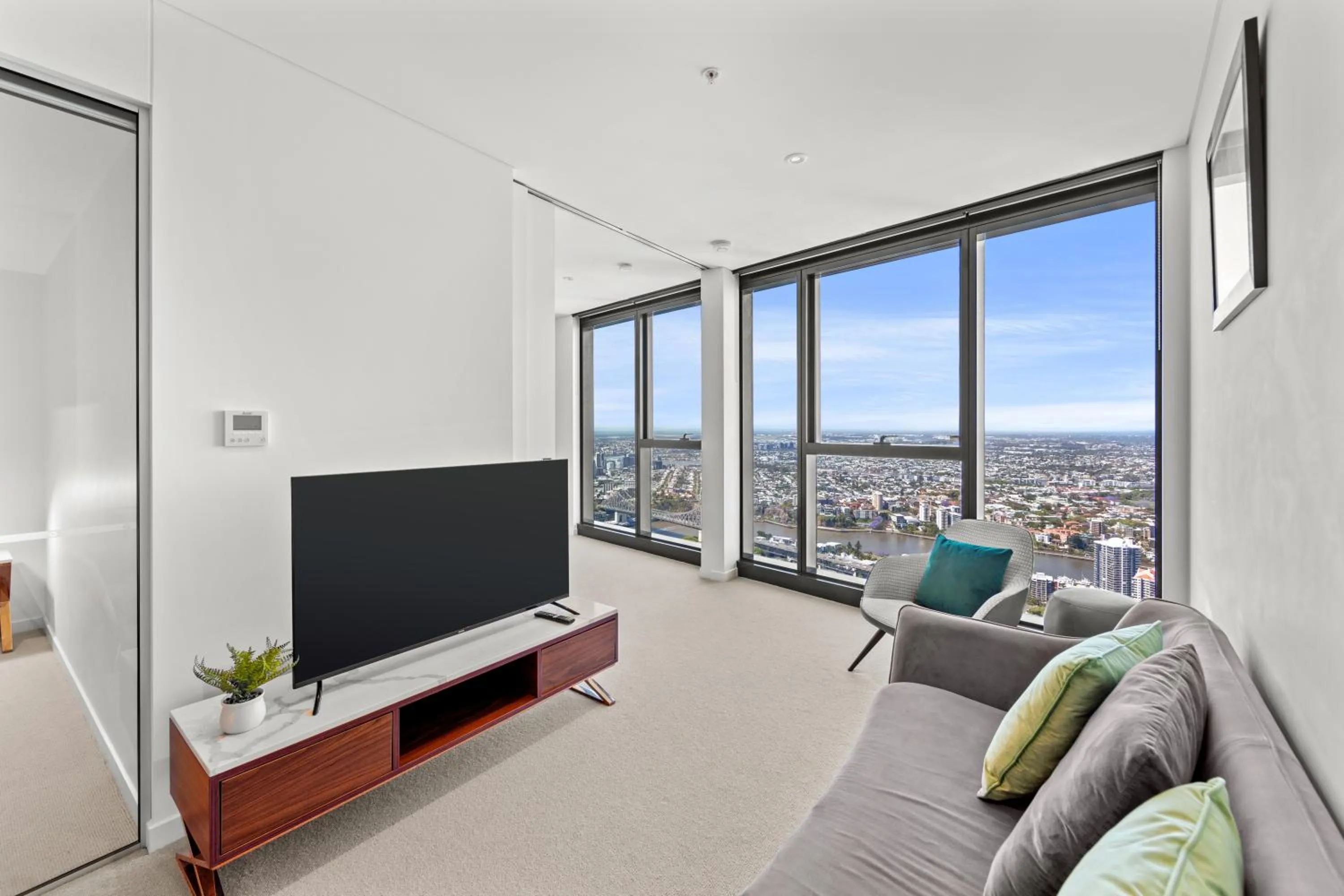 Living room in Brisbane Skytower by CLLIX