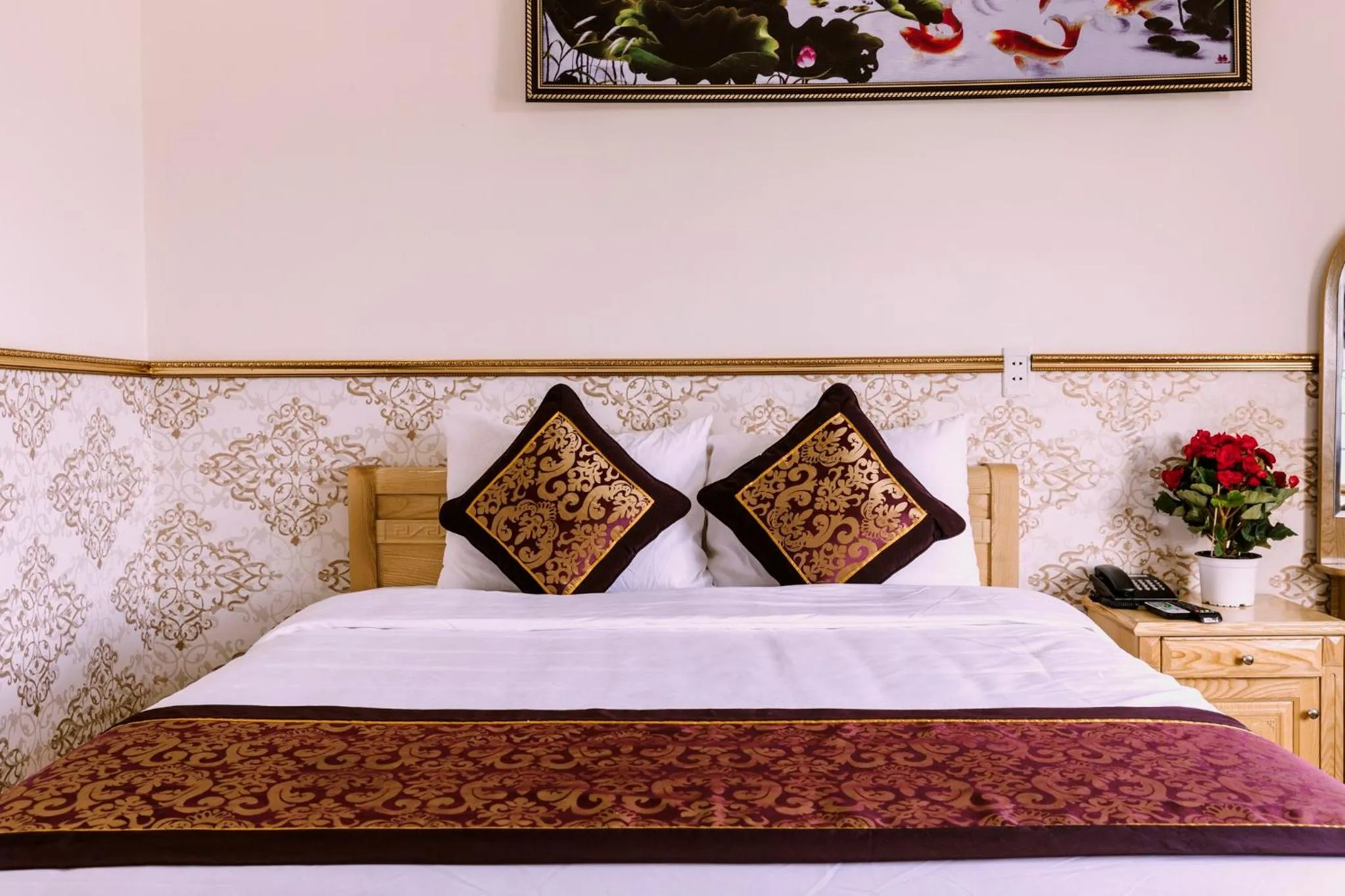 Bed in AEC Hotel Ban Me