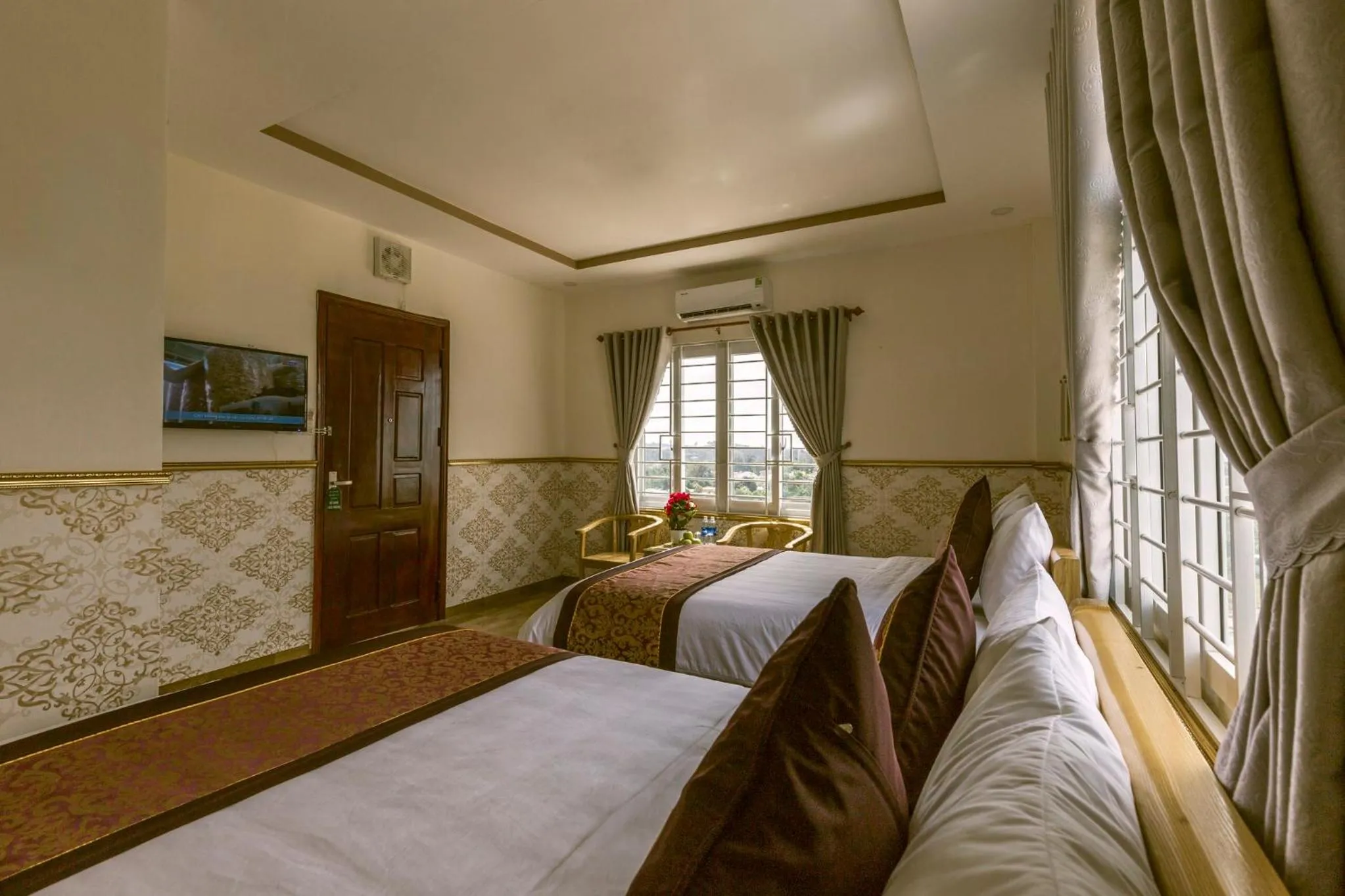 Bed in AEC Hotel Ban Me