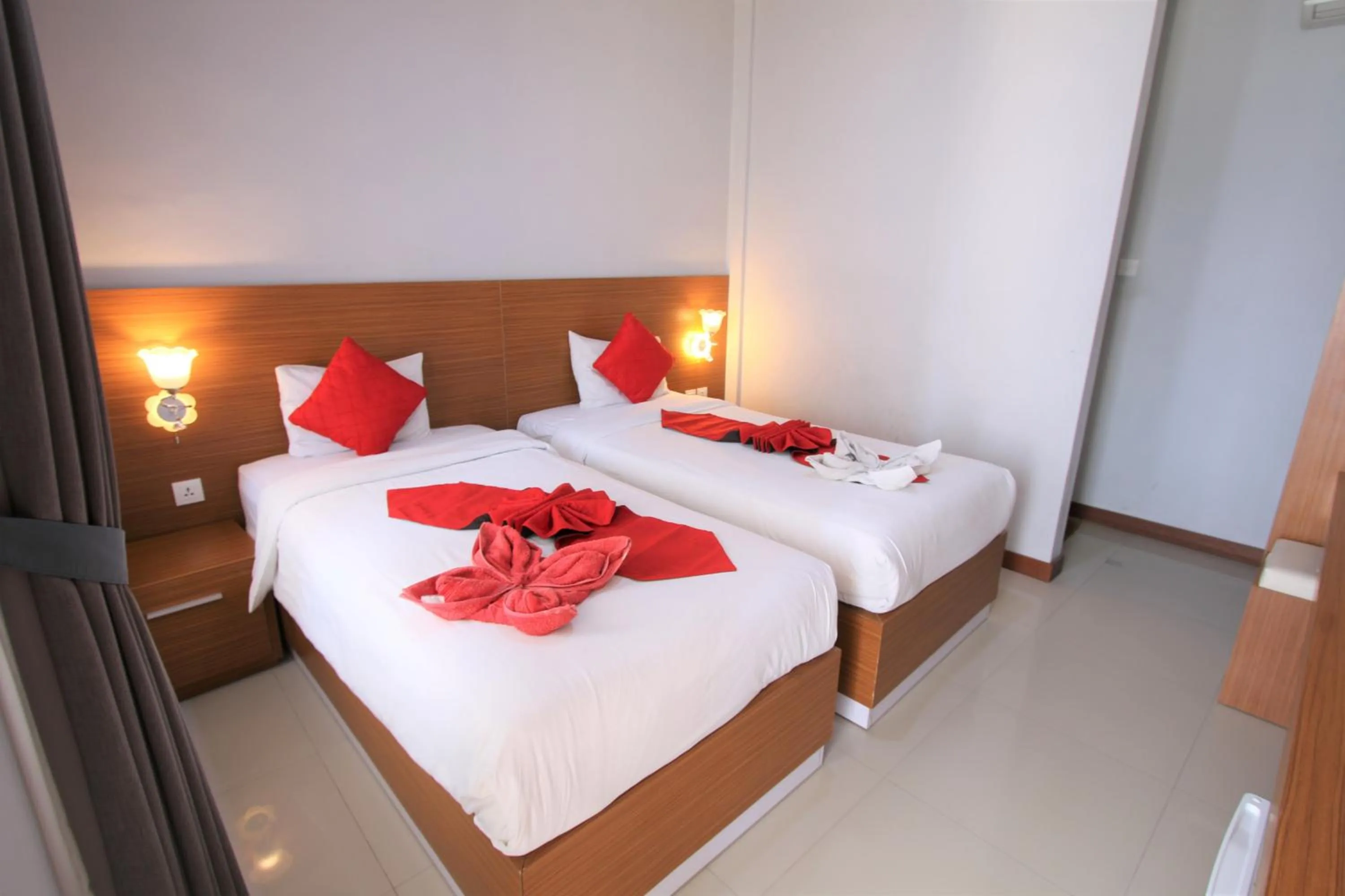 Bed in Tom Guest House