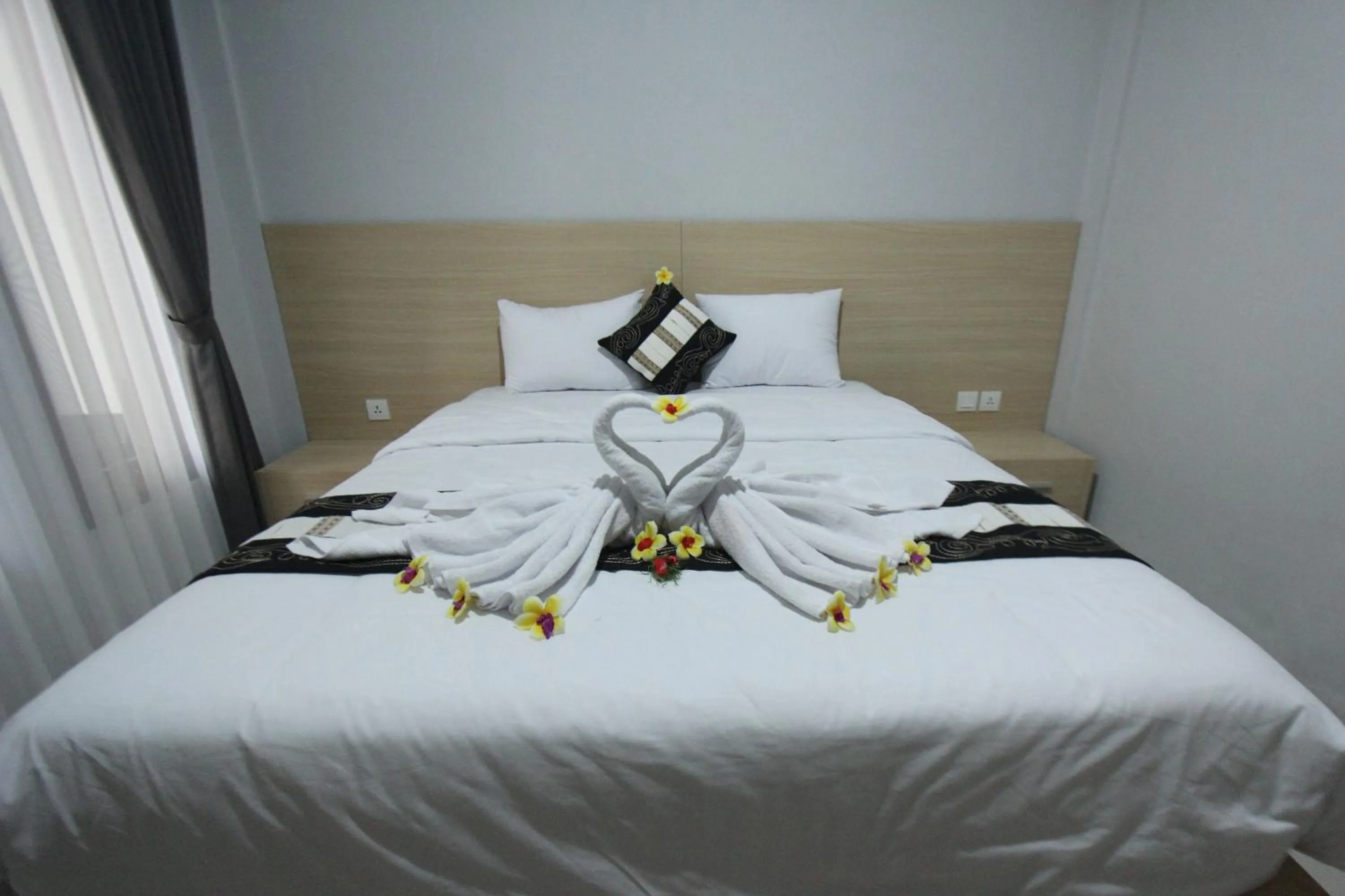 Bed in Tom Guest House