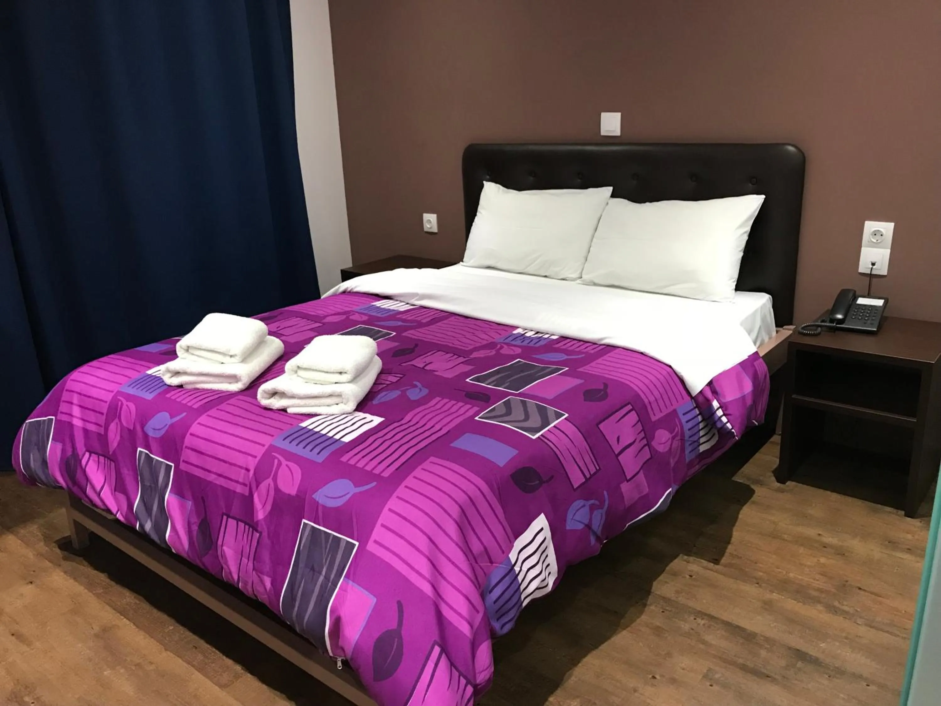 Bed in Mansion Hotel