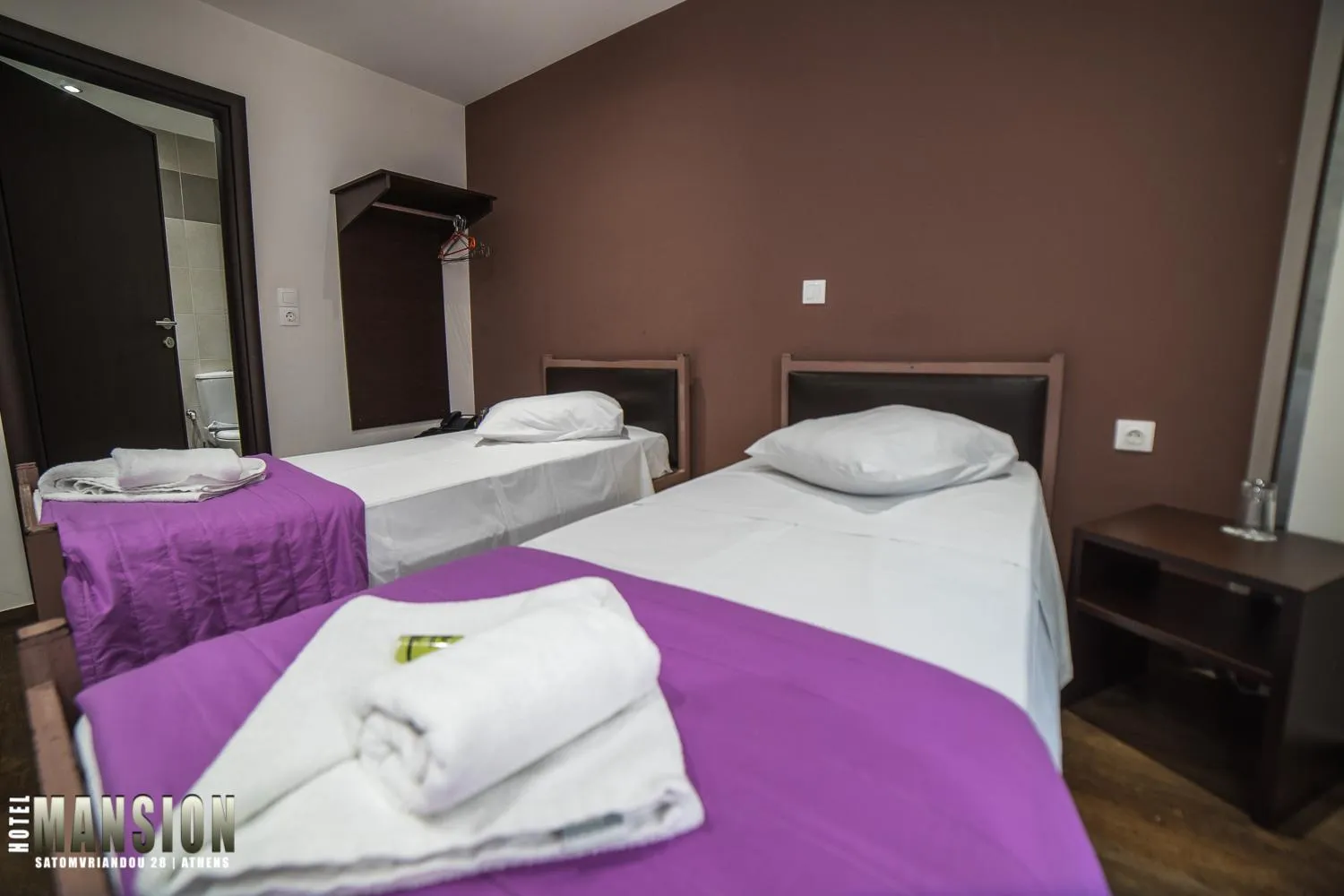 Bed in Mansion Hotel