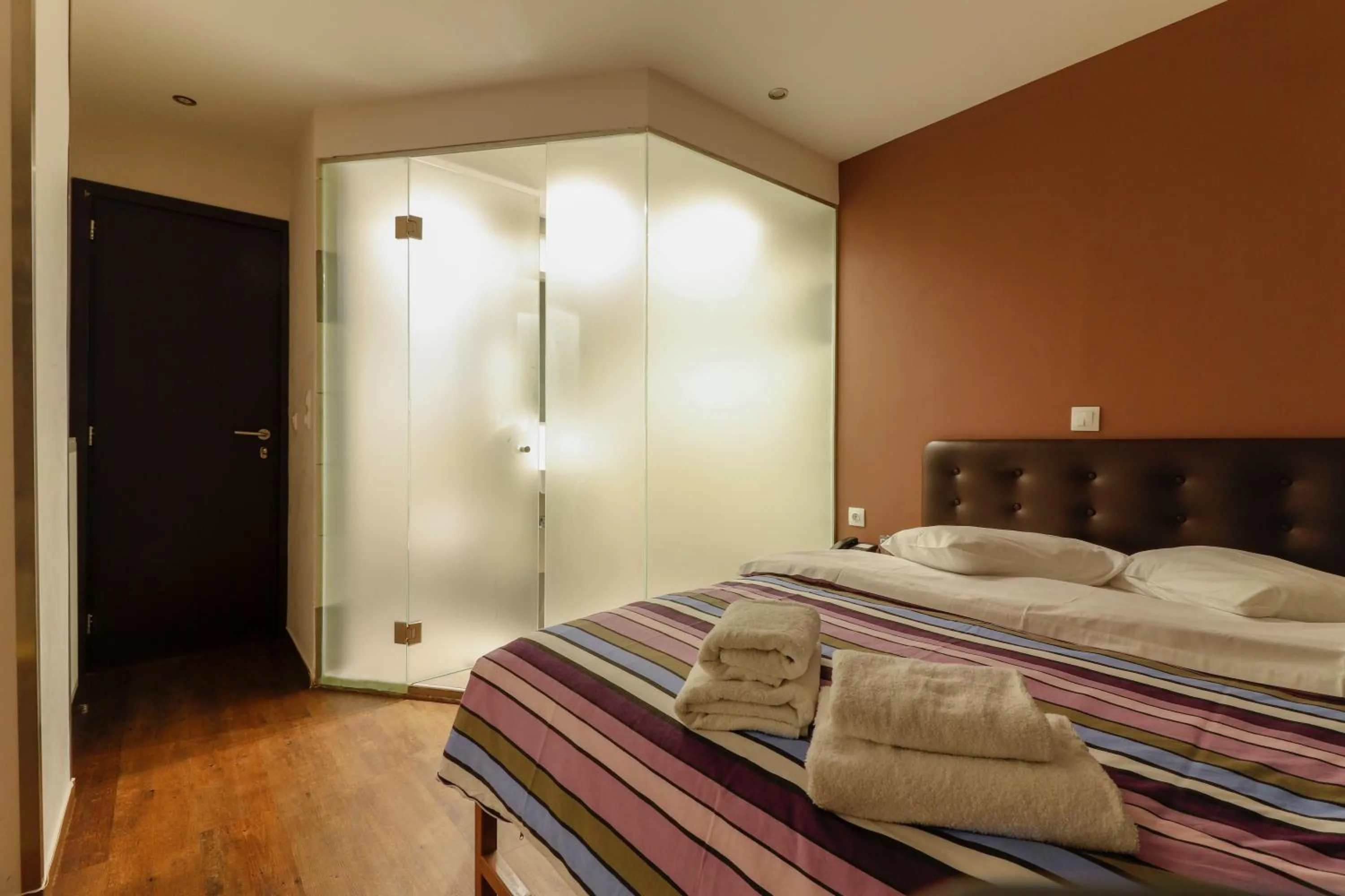 Bed in Mansion Hotel