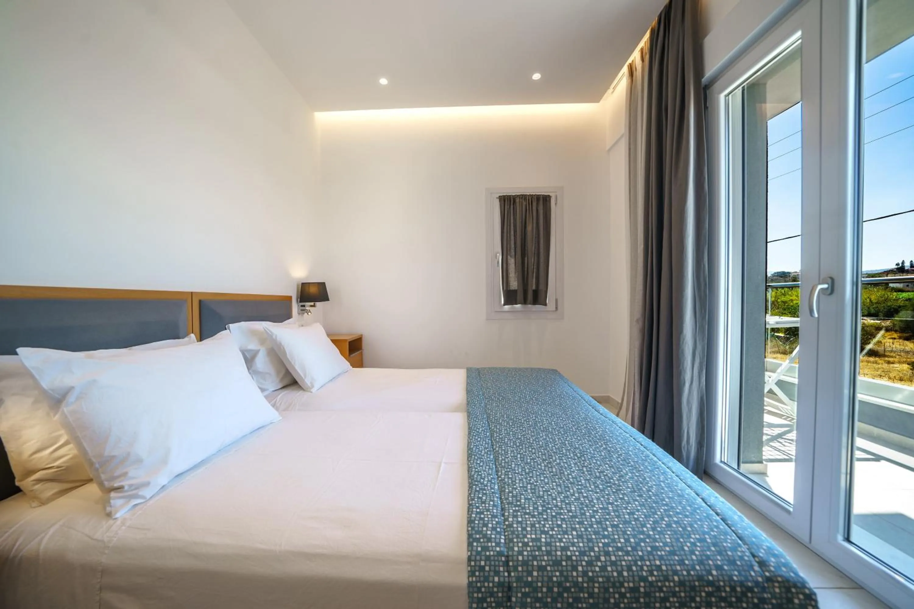 Bedroom, Bed in Elysian Suites