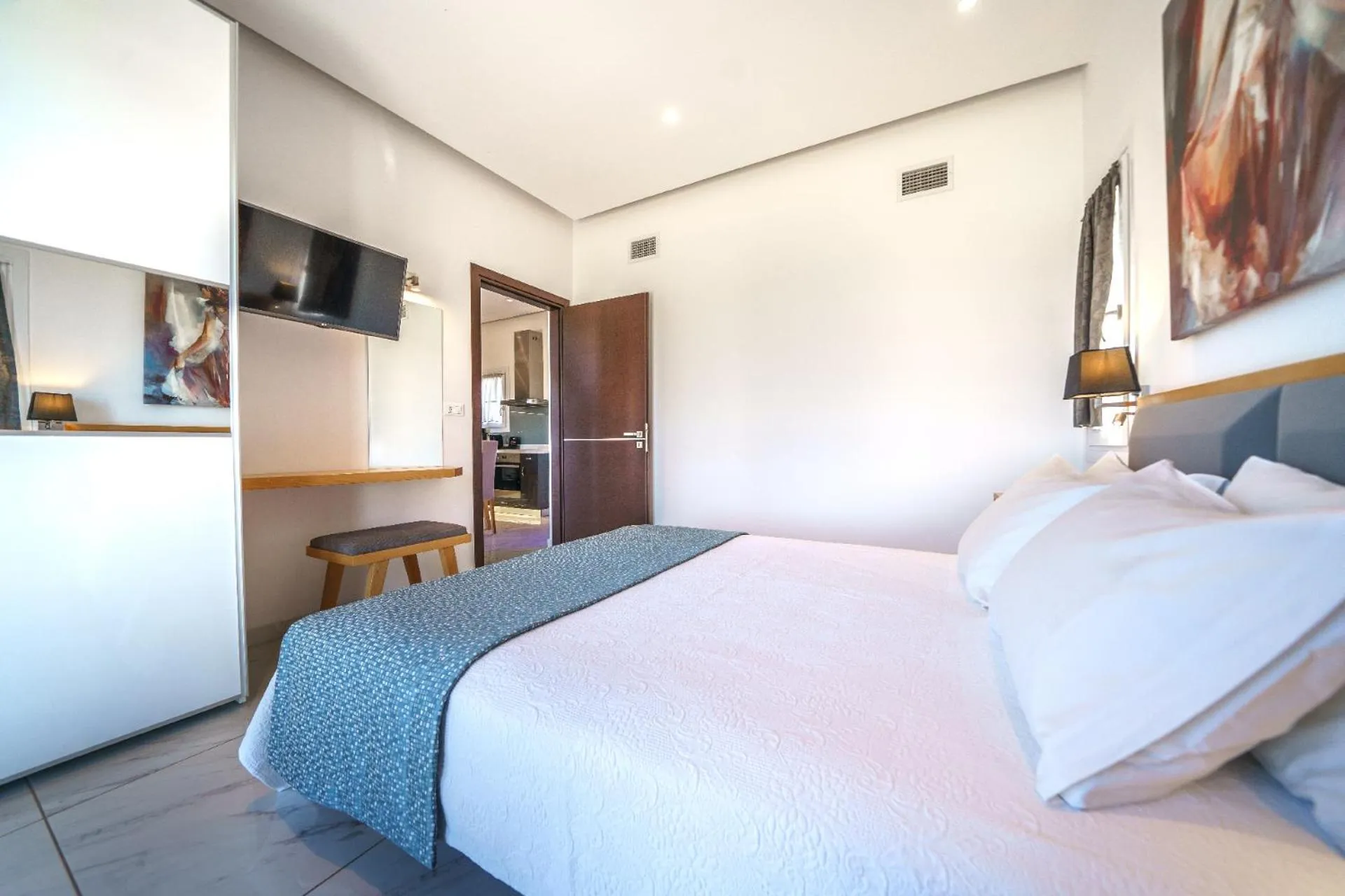 Bedroom in Elysian Suites