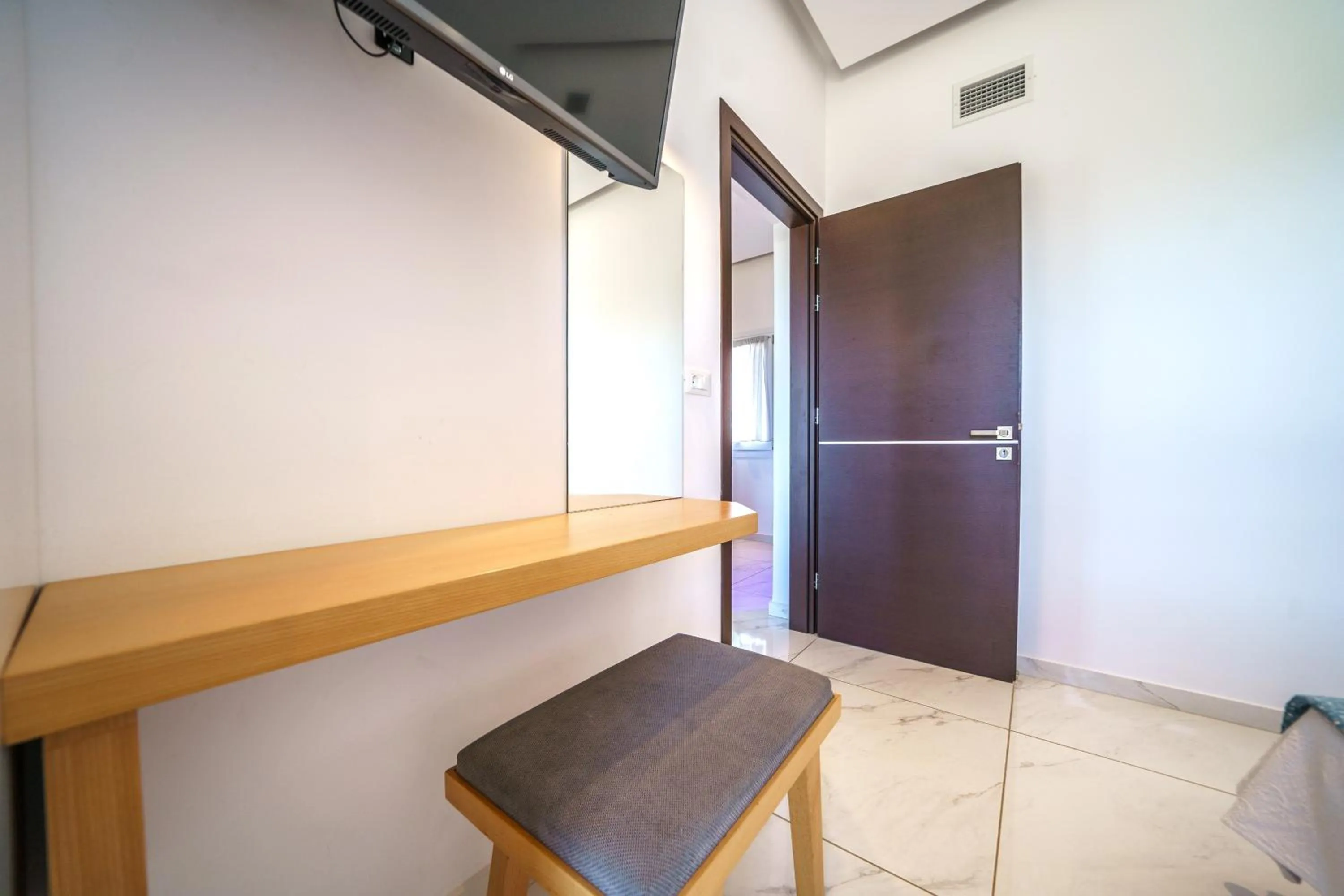 Bedroom in Elysian Suites