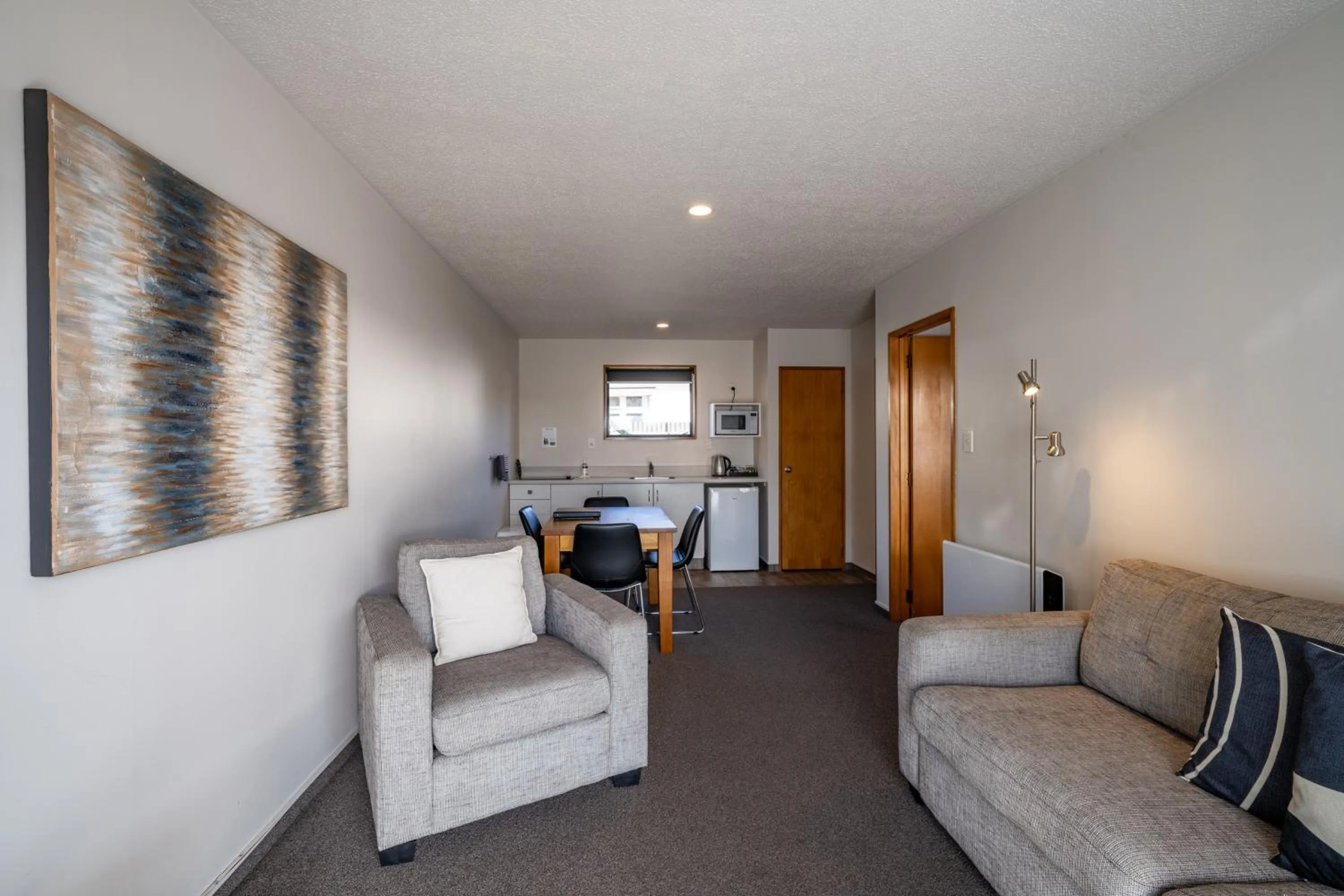 Living room in ASURE Highpark Motor Inn