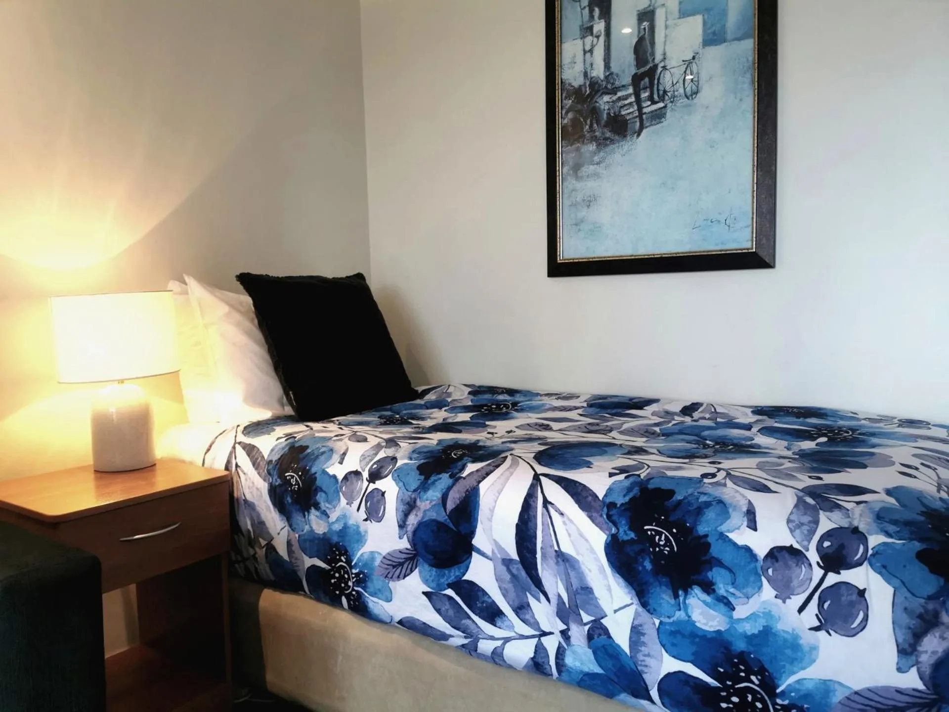 Bed in ASURE Ascot Motor Inn