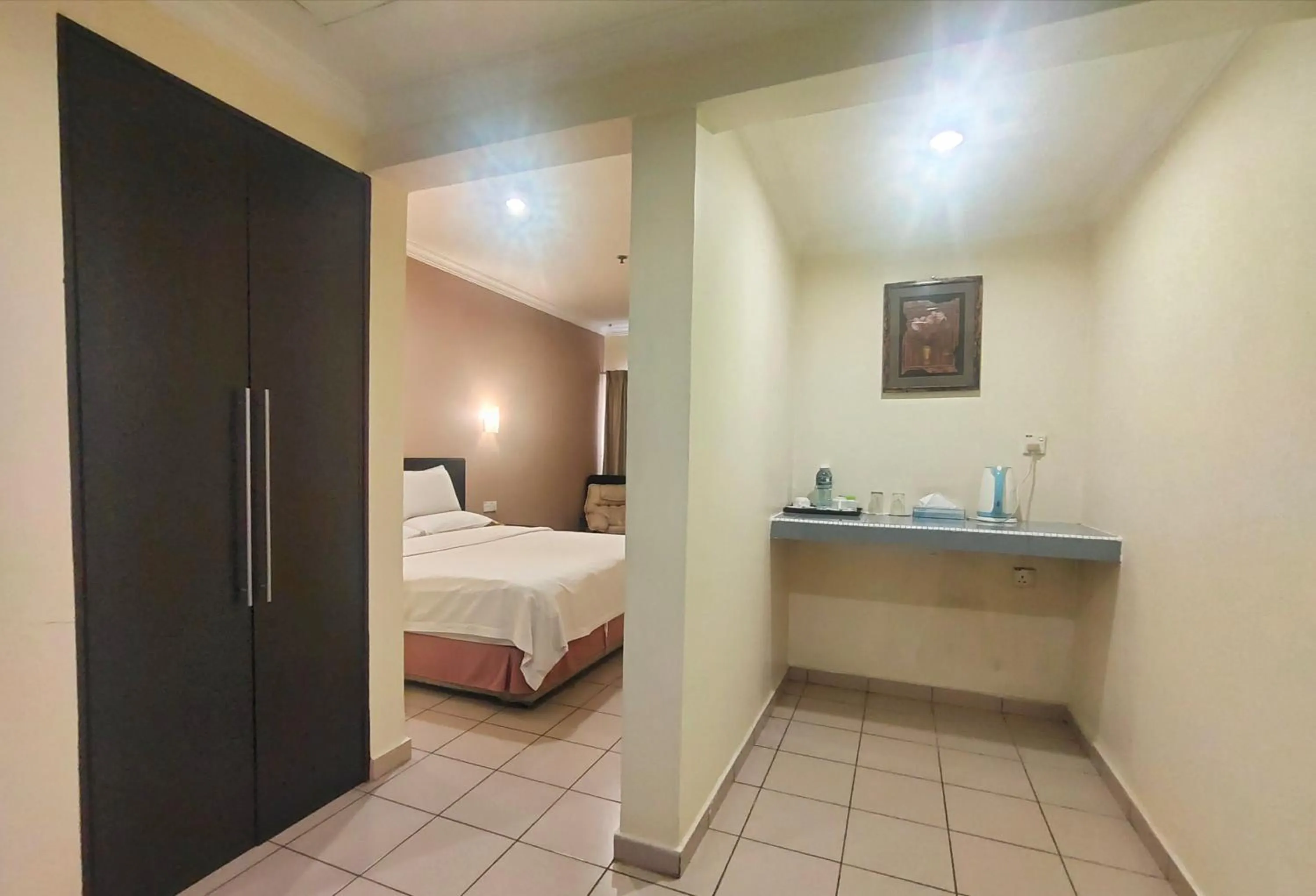 Property building, Bed in Megah D'aru Hotel