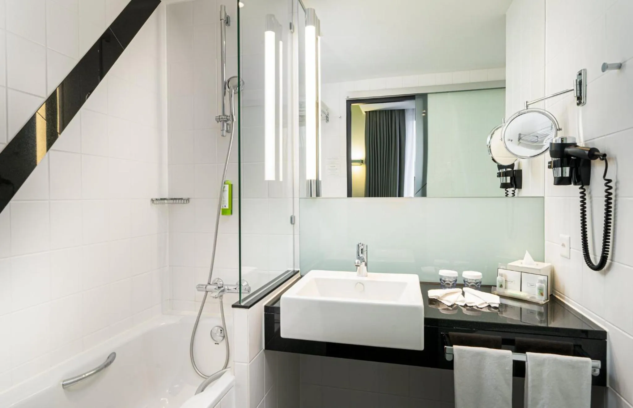 Bathroom in Holiday Inn Zürich Messe by IHG