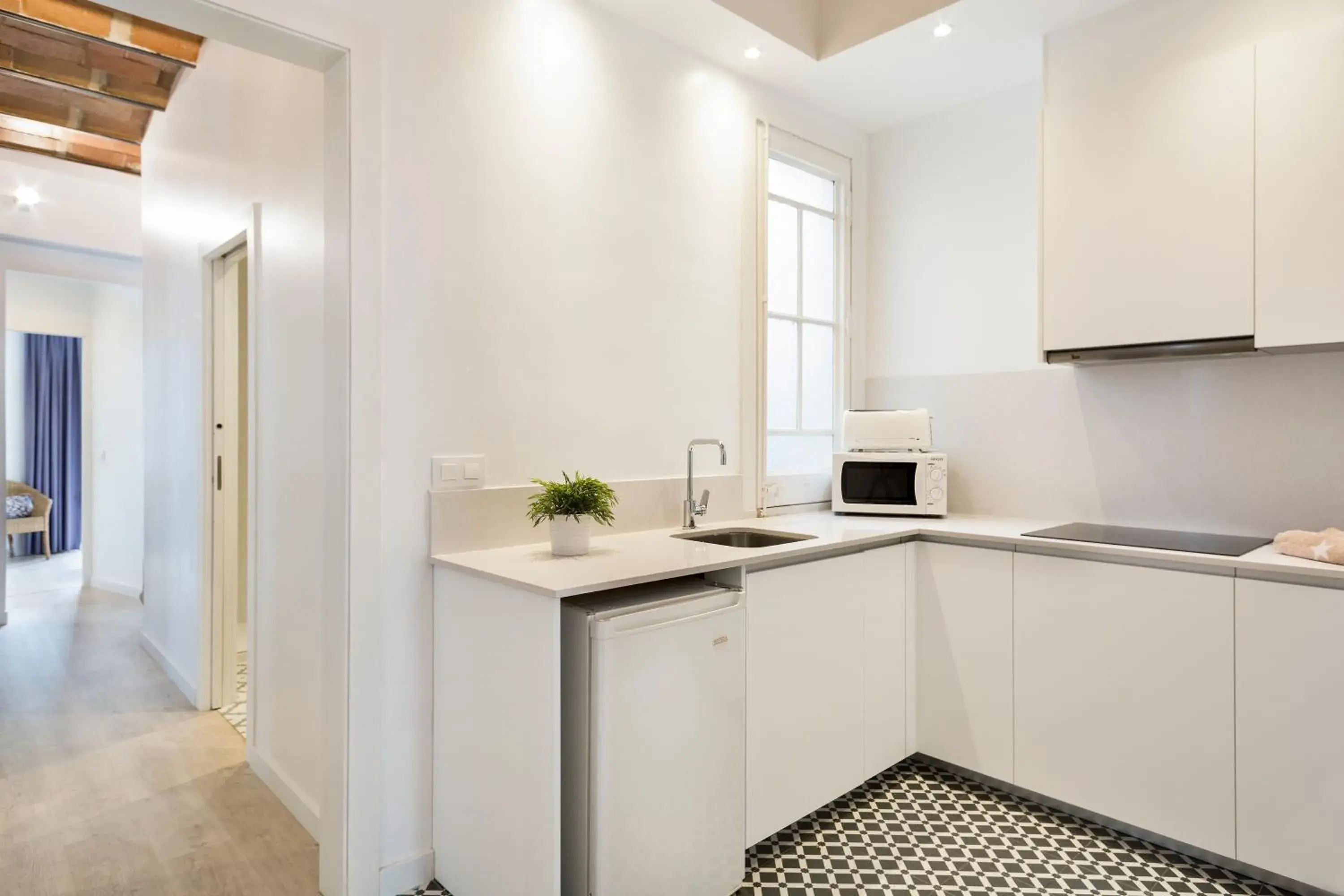 Kitchen or kitchenette in BcnStop Parc Güell Kitchen or kitchenette in BcnStop Parc Güell