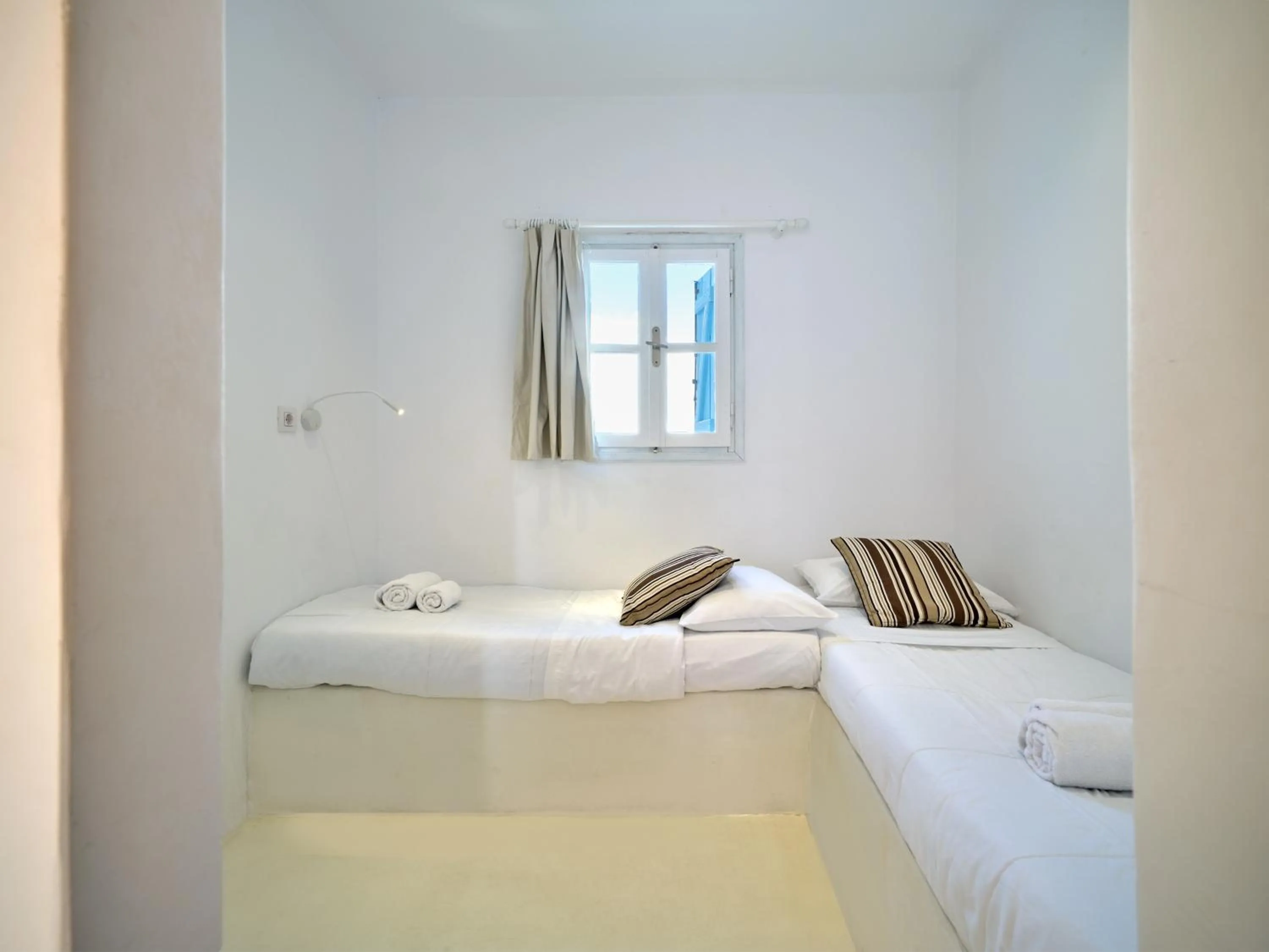 Bed in Zefi Hotel & Suites