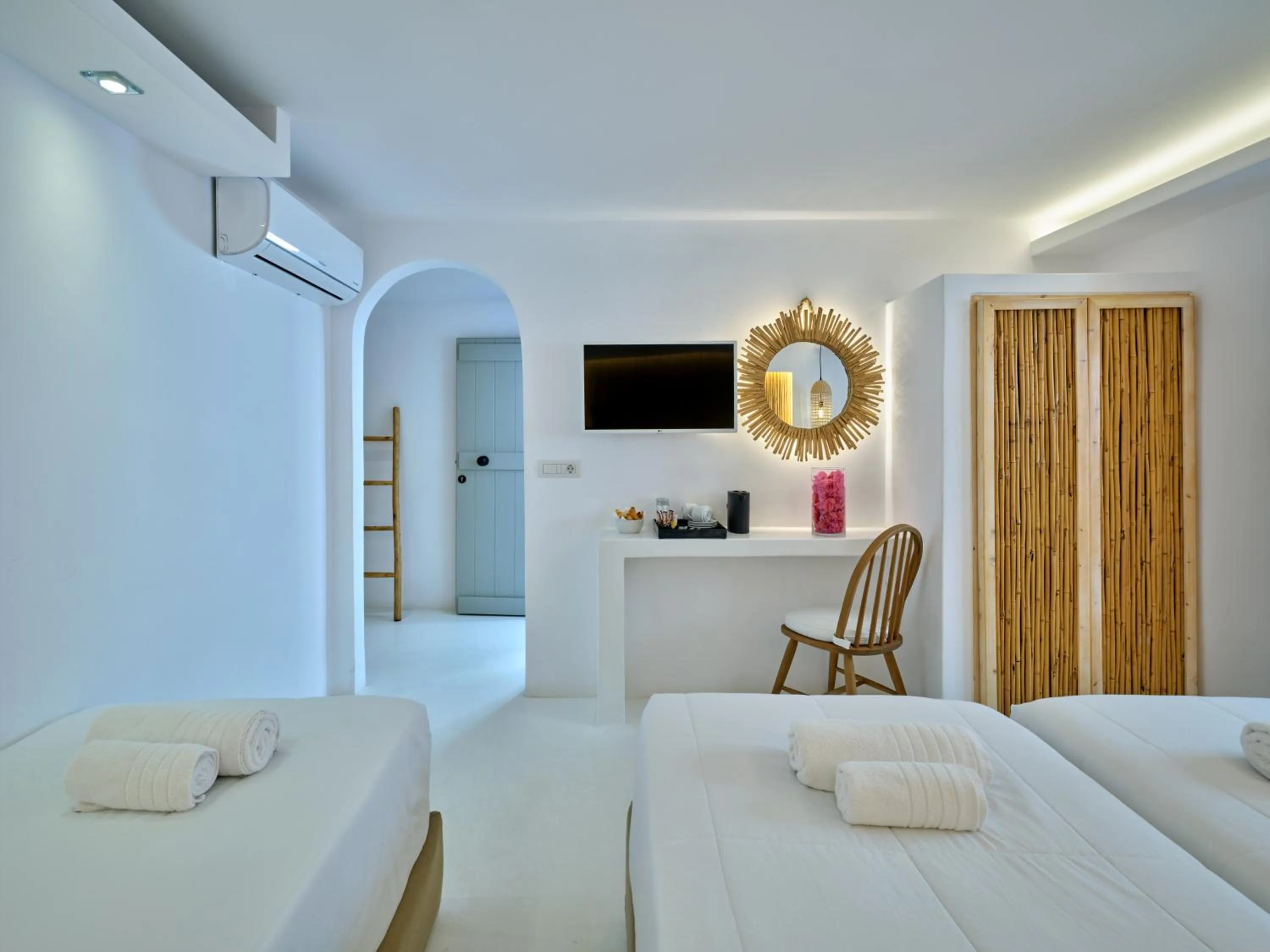 Bed in Zefi Hotel & Suites