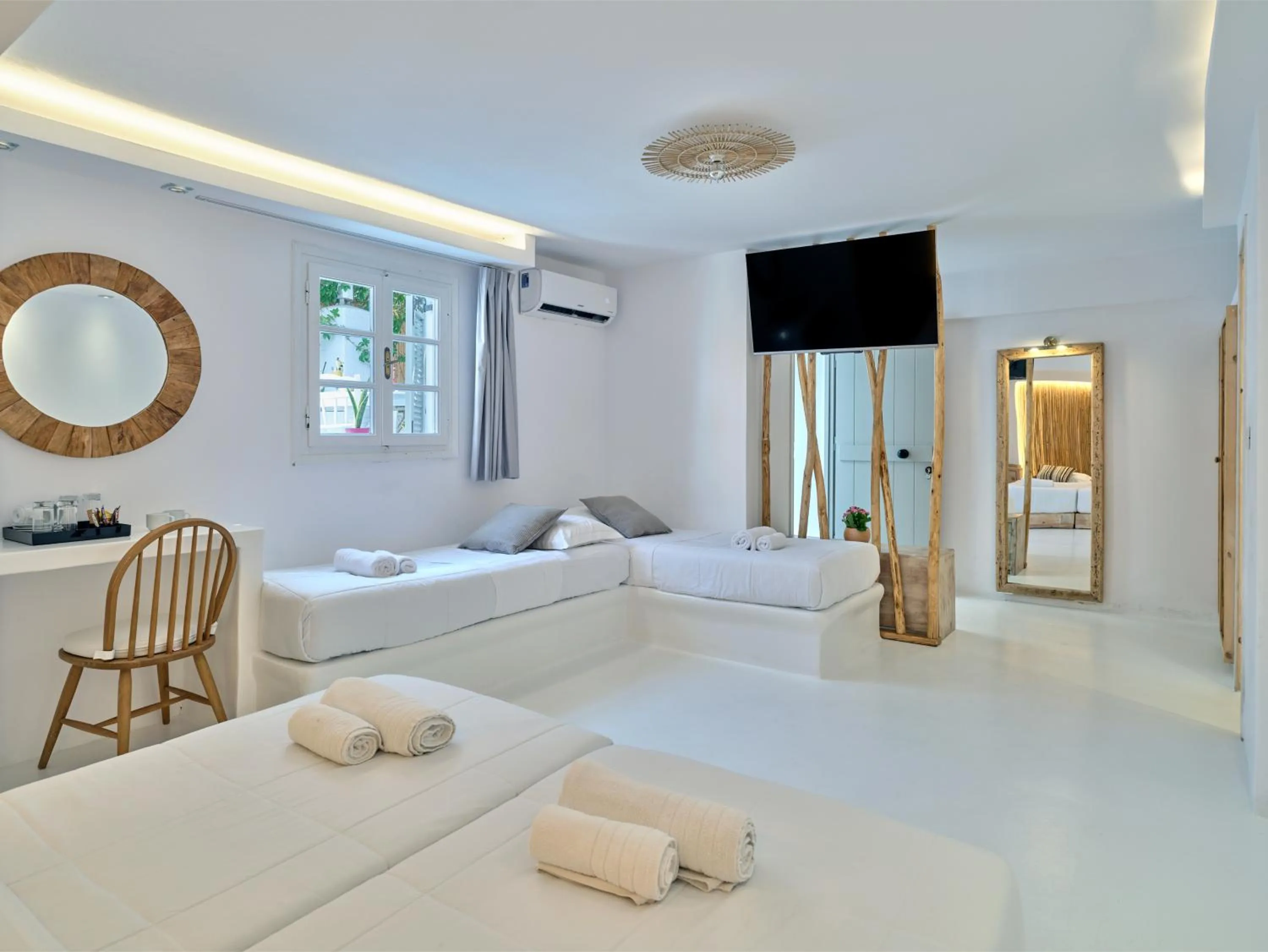 Bed in Zefi Hotel & Suites