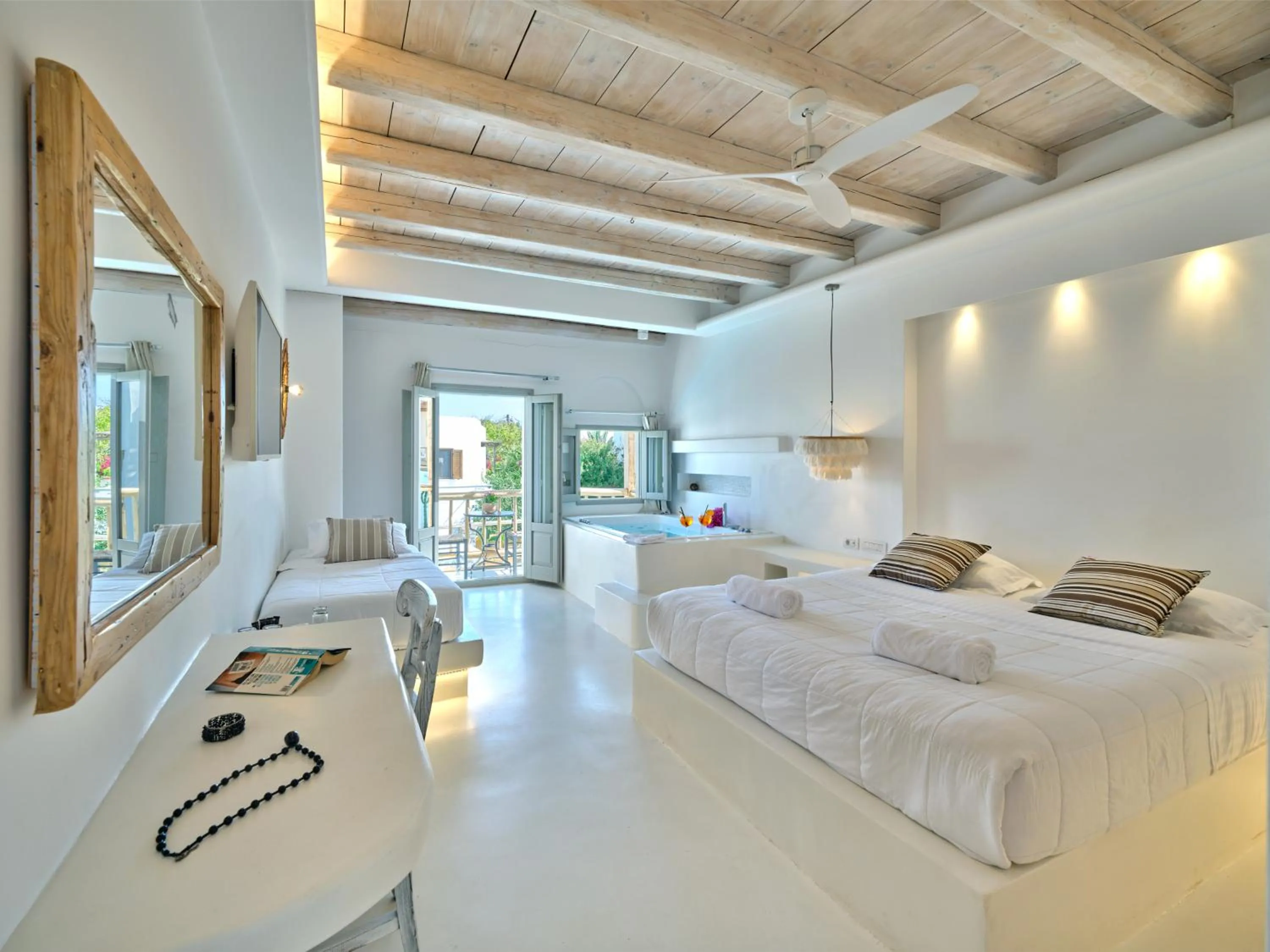 Bed in Zefi Hotel & Suites