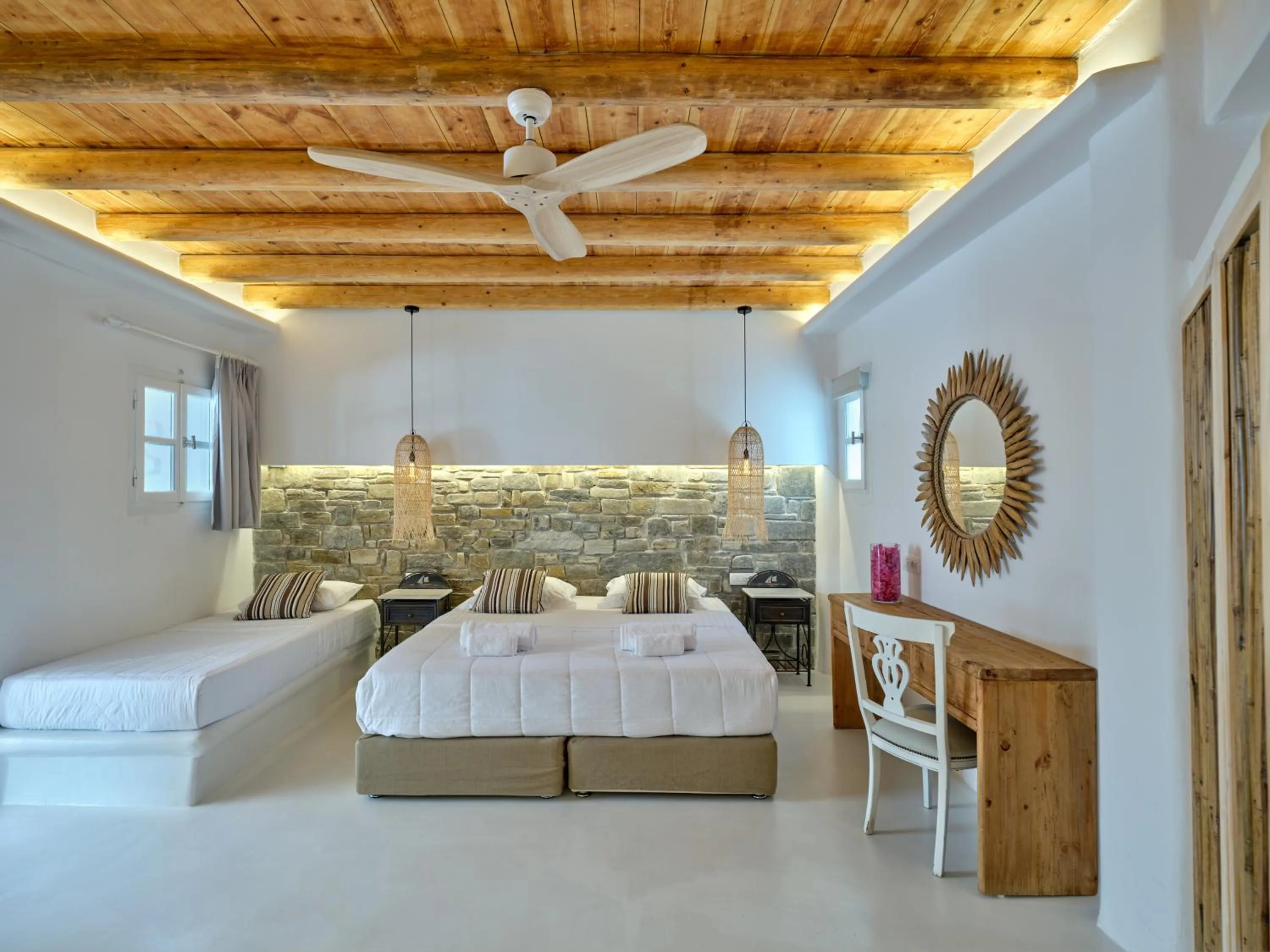 Bed in Zefi Hotel & Suites