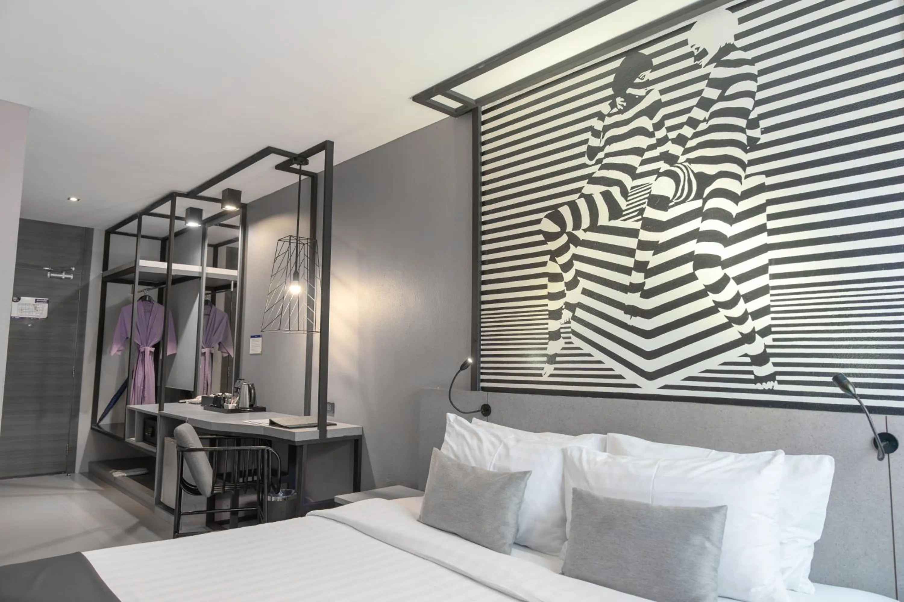 Bed in Mazi Design Hotel by Kalima