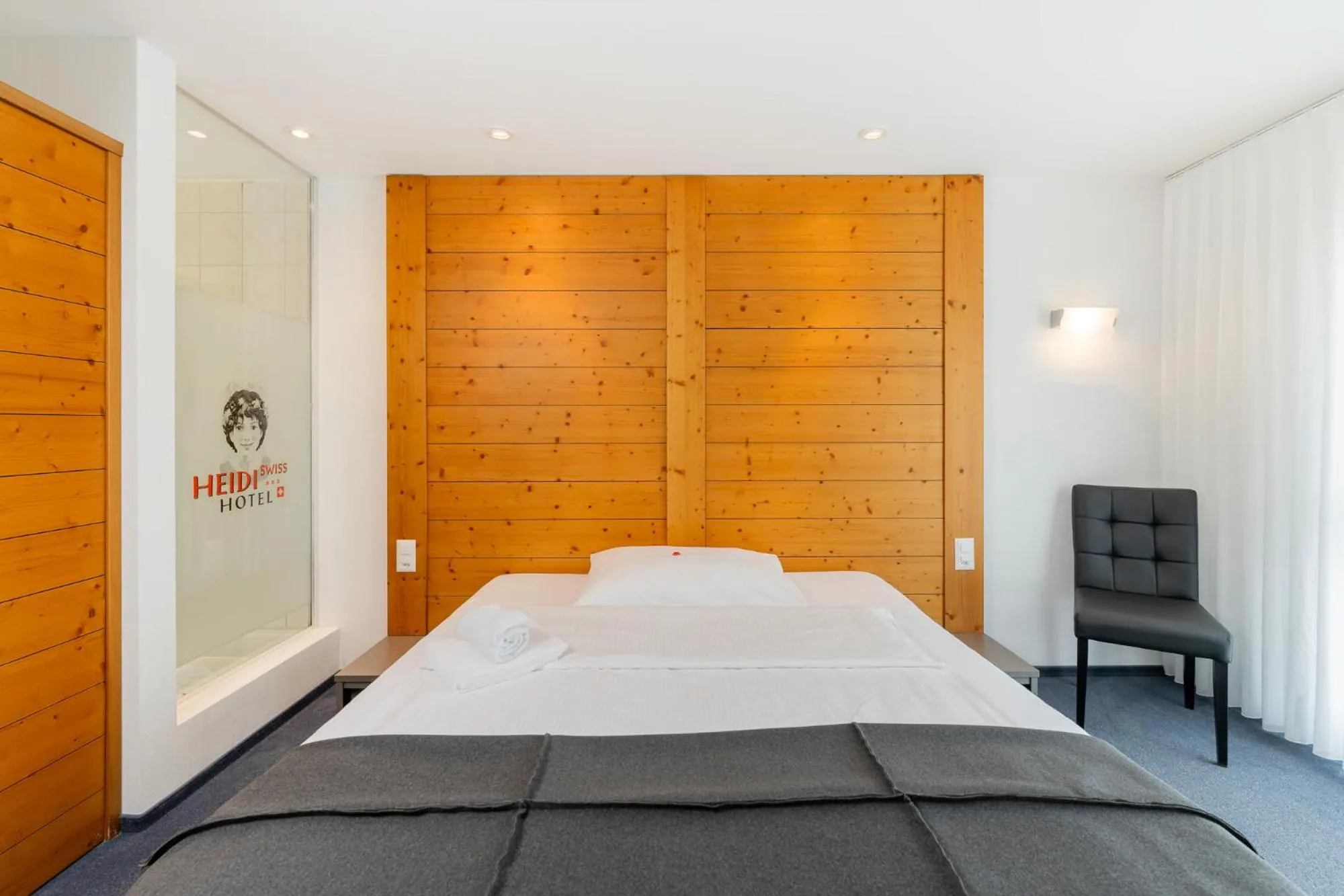 Bed in Swiss Heidi Hotel