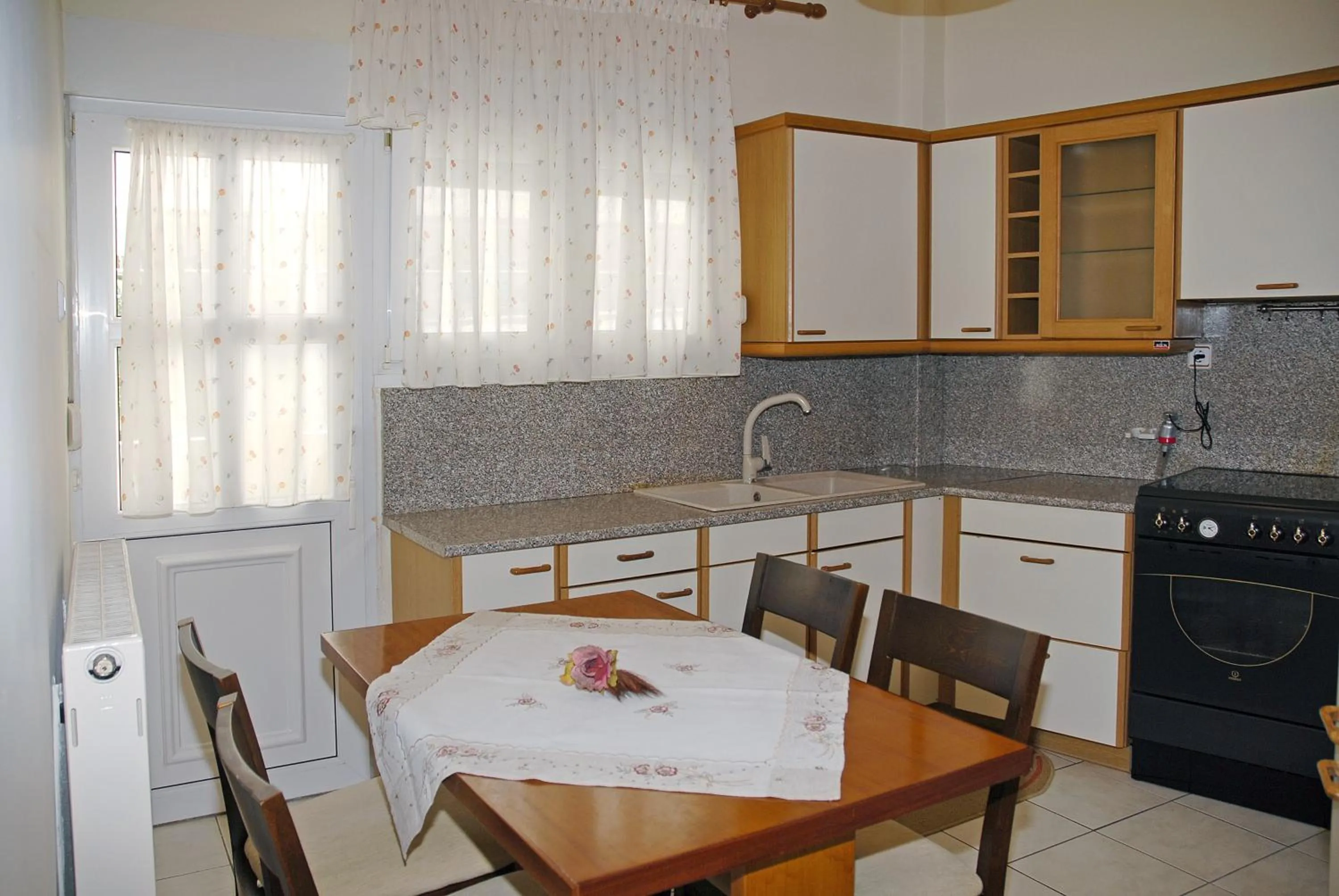 Kitchen or kitchenette in Kronos Hotel