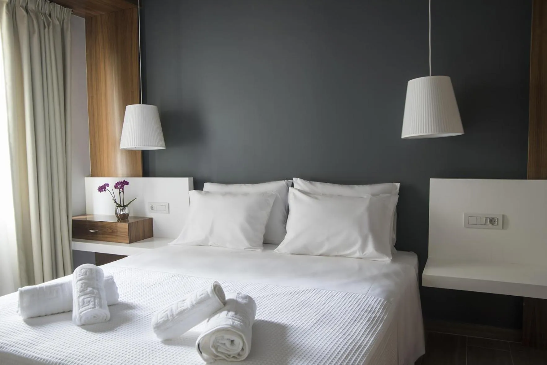 Bed in AD Athens Luxury Rooms & Suites