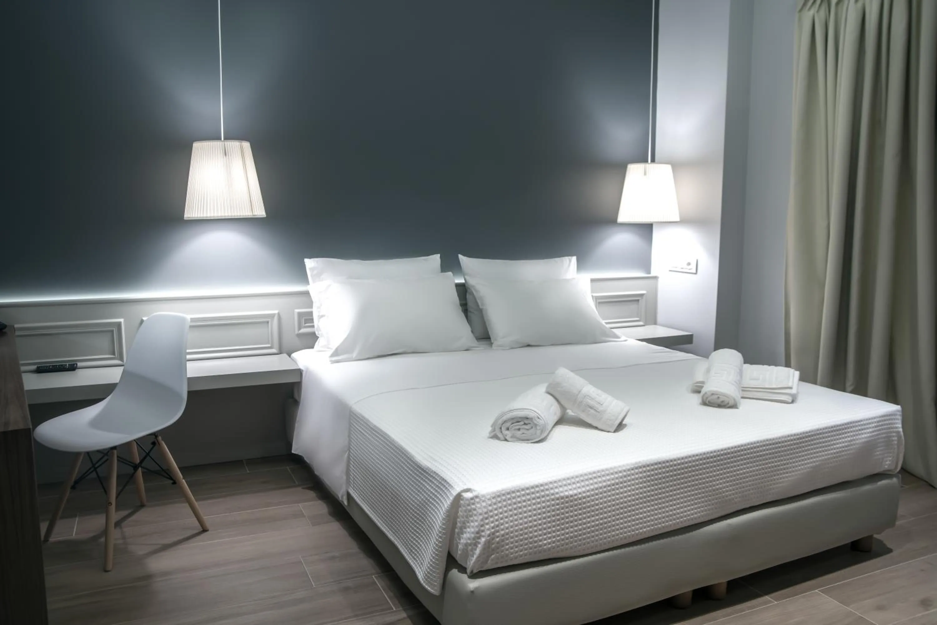 Bed in AD Athens Luxury Rooms & Suites