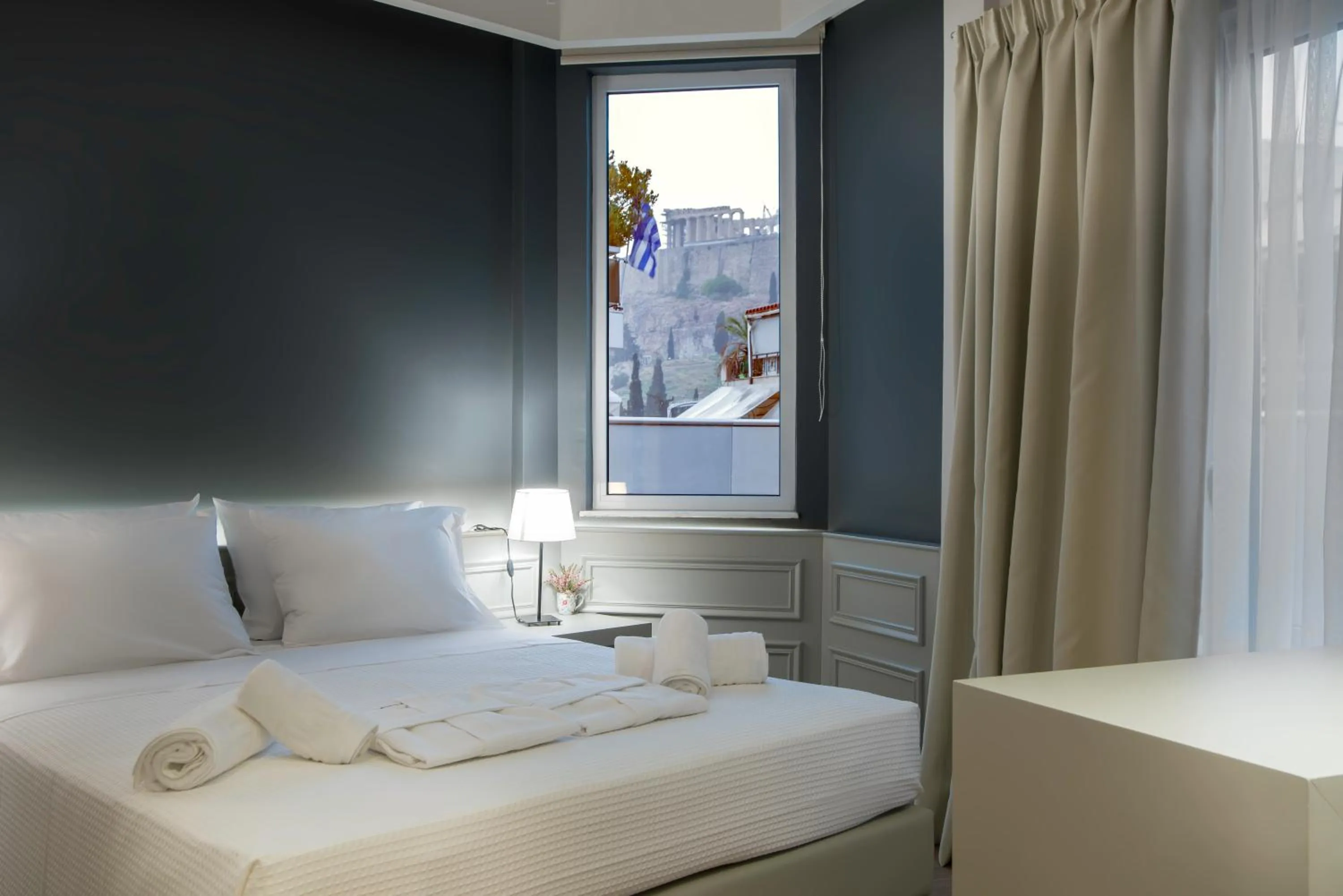 Bed in AD Athens Luxury Rooms & Suites