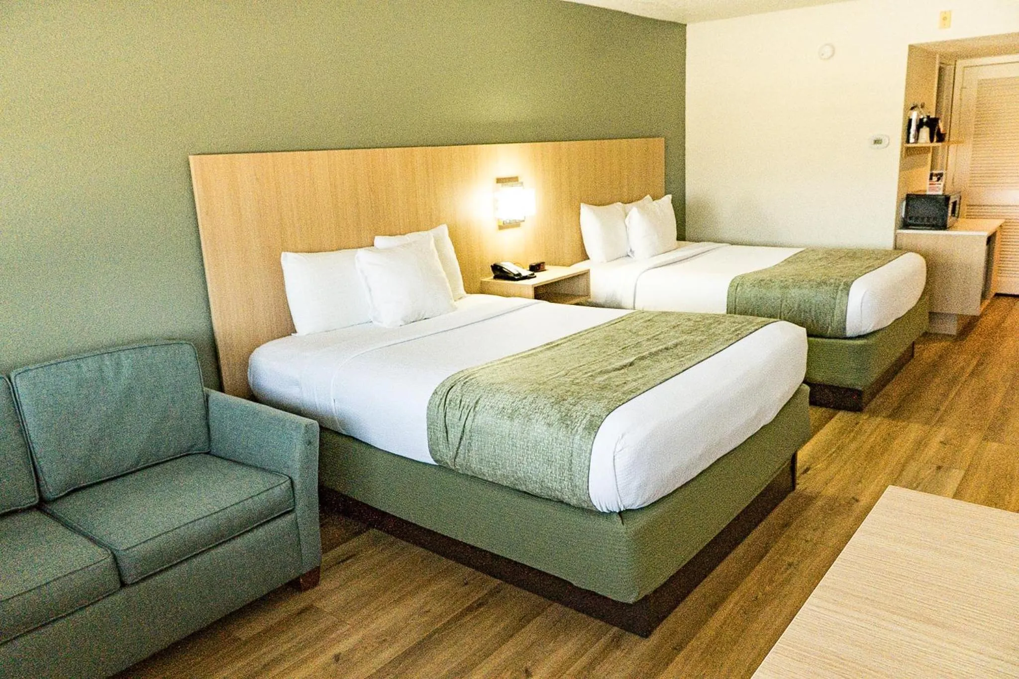 Seating area, Bed in Coco Key Hotel & Water Park Resort