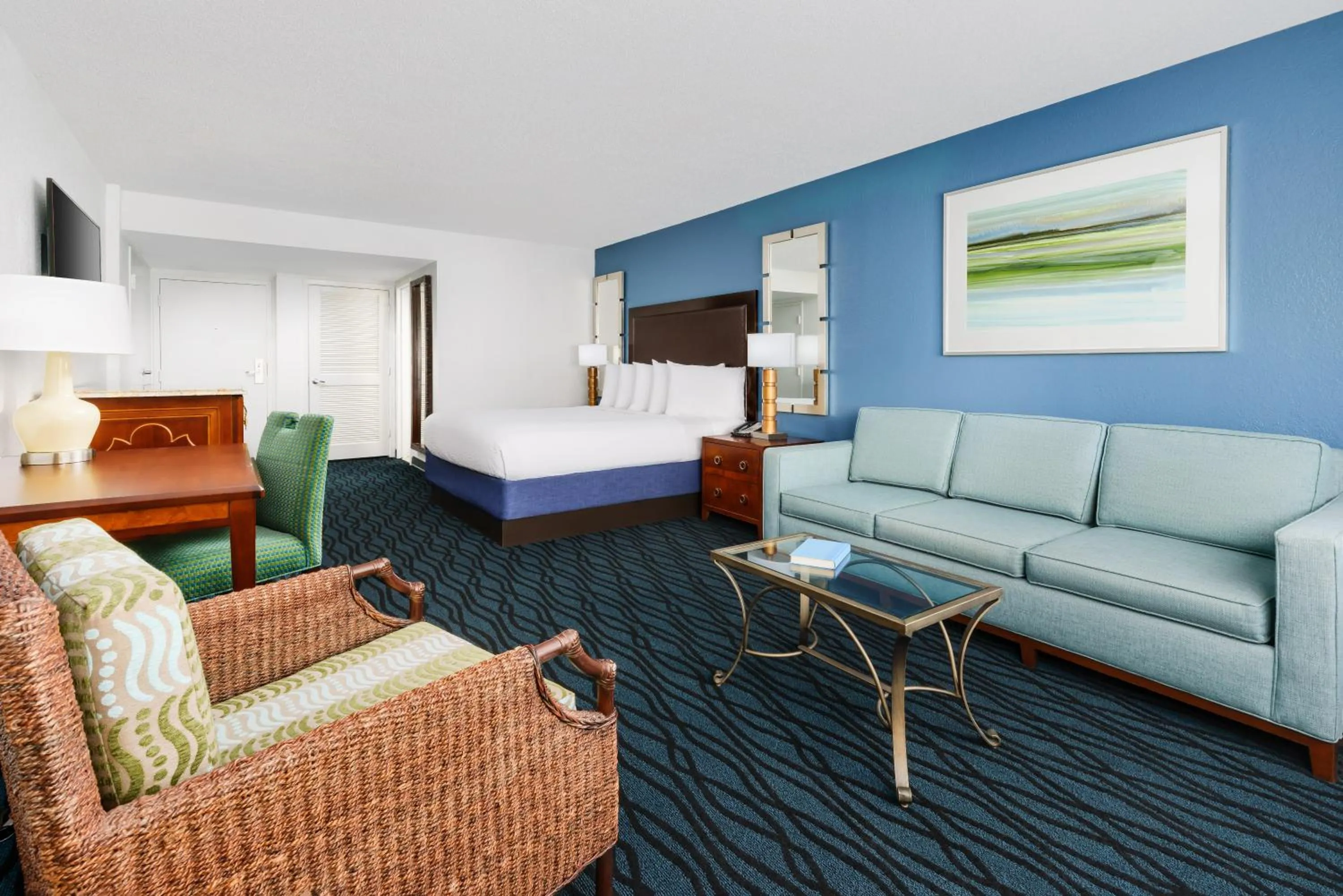 Seating area, Bed in Coco Key Hotel & Water Park Resort