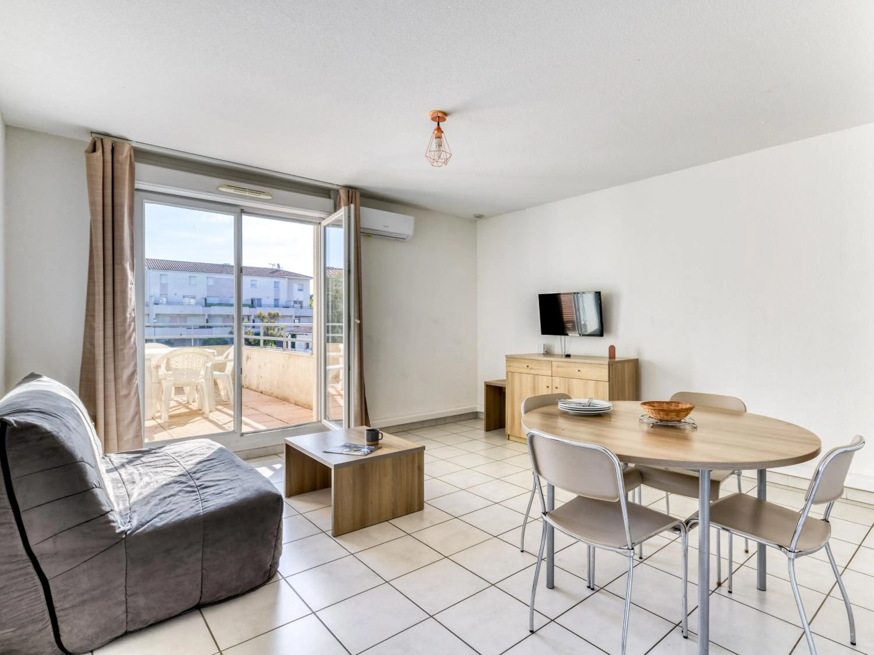 Living room in Vacancéole - Résidence Cap Camargue